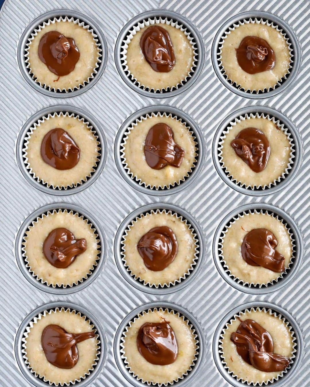 Easy Recipesさんのインスタグラム写真 - (Easy RecipesInstagram)「Craving banana muffins? Try these extra delicious Nutella Swirl Banana Muffins. Link in my bio.  https://www.cookinwithmima.com/nutella-swirl-banana-muffins/」12月22日 0時22分 - cookinwithmima
