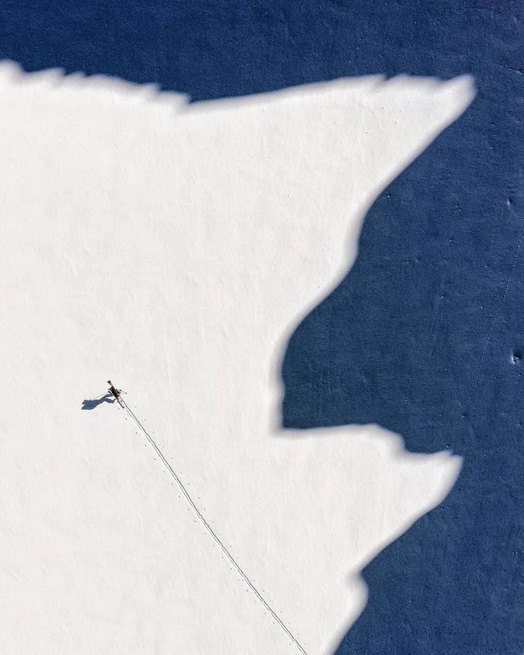 National Geographic Travelさんのインスタグラム写真 - (National Geographic TravelInstagram)「Photo by @jimmychin | Kit DesLauriers draws lines among mountain shadows while plotting the first ski descents on the western coast of Greenland. For more images of adventures in Greenland follow @jimmychin.」12月23日 10時04分 - natgeotravel