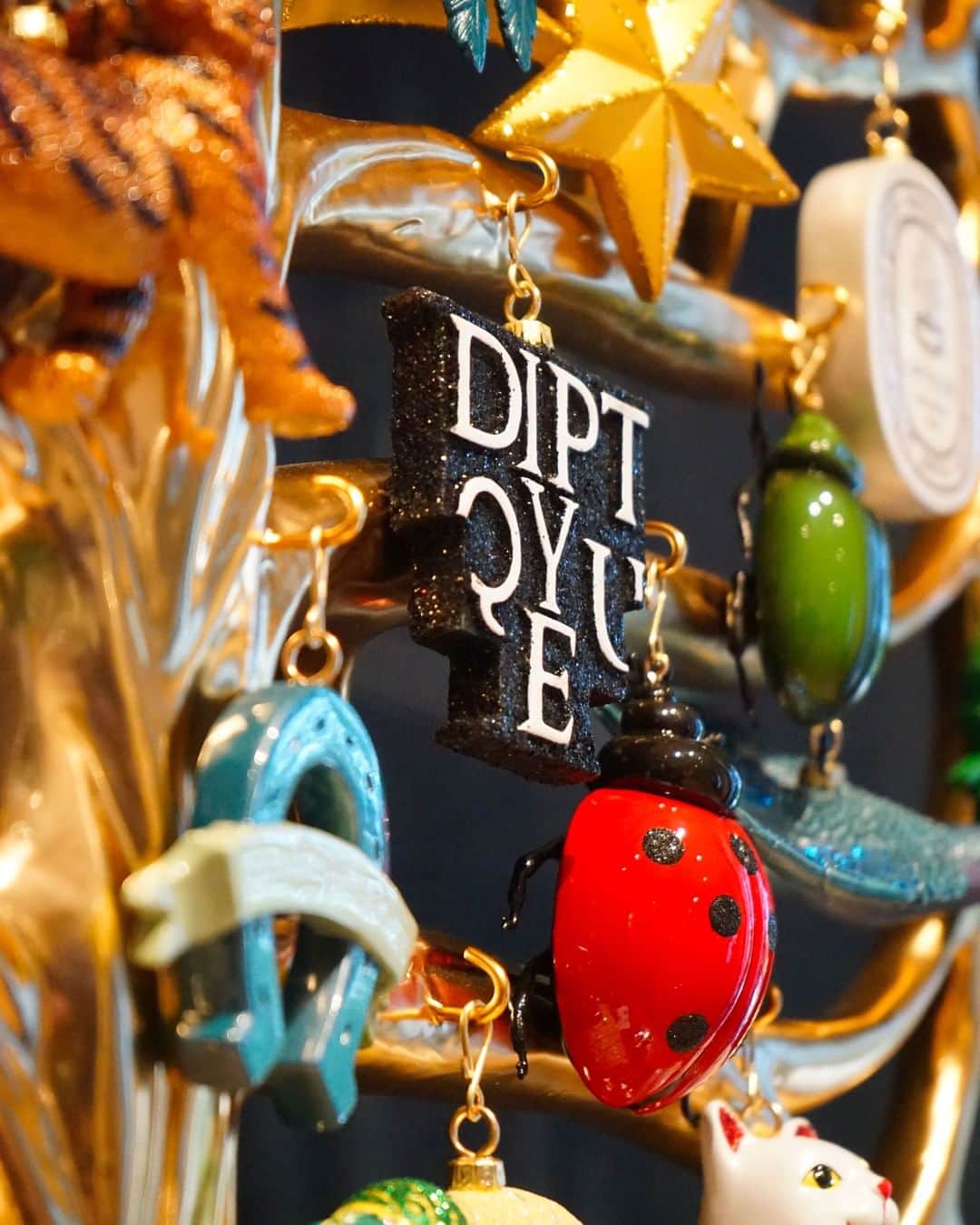 のインスタグラム：「Allow our lucky baubles to join in your celebrations this year! #diptyque #luckycharms #holidaycollection」