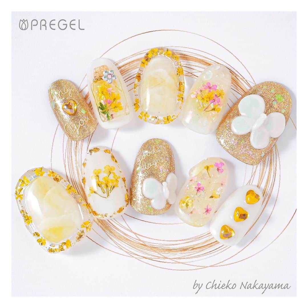 なかやまちえこのインスタグラム：「2020 PREGELカレンダーのネイル💅 #nail #nails #nailart #ネイル #美甲 #ネイルアート  #clou #nagel #ongle #ongles #unghia #japanesenailart #manucure #네일 #젤네일 #네일아트 #네일리스트 #japanesenails #manicurist #gelnails #أظافر #お花ネイル #フラワーネイル #Flowernails #イエローネイル #yellownails」