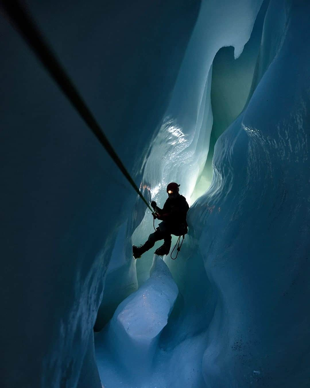 National Geographic Travelさんのインスタグラム写真 - (National Geographic TravelInstagram)「Photo by Robbie Shone @shonephoto | Early morning sunlight filters through the roof of this cave in the Gorner Glacier, Switzerland. When rising temperatures begin to melt the ice, it’s time to leave the underworld behind and return to the surface before it gets too dangerous to be there.」12月25日 22時08分 - natgeotravel