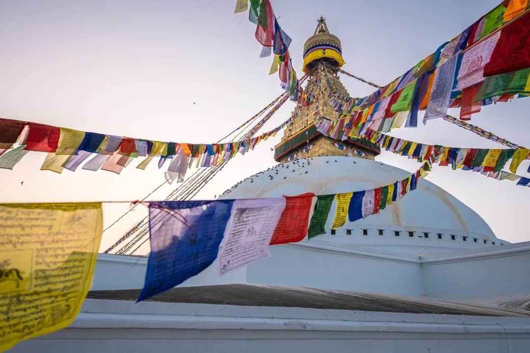 National Geographic Travelさんのインスタグラム写真 - (National Geographic TravelInstagram)「Photo by @michaelclarkphoto | On a recent trip in Nepal, jet lag had me up at 2:30 a.m., making it easy to get out and explore the Boudhanath Stupa at sunrise in central Kathmandu. It's a UNESCO World Heritage site and the largest stupa in Nepal. It is also a busy area, especially at dawn when people come to pray and are on their way to work. #boudhanath #stupa #kathmandu #nepal」12月26日 2時06分 - natgeotravel