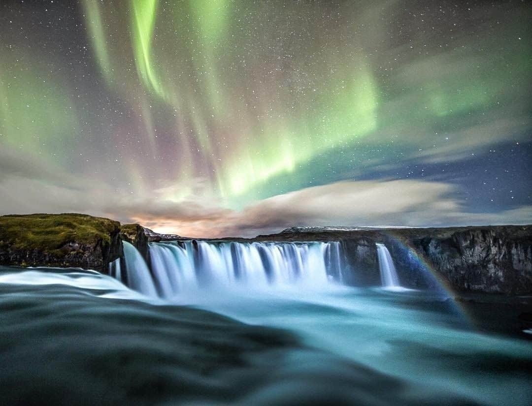 National Geographic Travelさんのインスタグラム写真 - (National Geographic TravelInstagram)「Photo by @renan_ozturk | A moonbow, northern lights, stars, and Goðafoss are all frozen for a moment in northern Iceland. Follow @renan_ozturk for more slices of time in the far north.」12月27日 18時08分 - natgeotravel