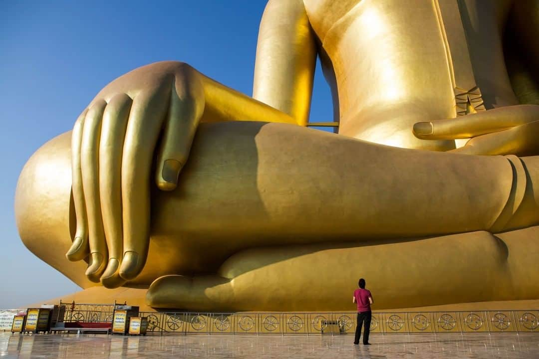 National Geographic Travelさんのインスタグラム写真 - (National Geographic TravelInstagram)「Photo by @amandamustard | Perched quietly among the rice fields of Thailand's Ang Thong Province is the country's largest sitting Buddha statue. Locally referred to as Big Buddha, this gold-painted feat stands 302 feet (92 meters) tall and took 18 years to construct. #Thailand #angthong #buddha」12月28日 14時09分 - natgeotravel