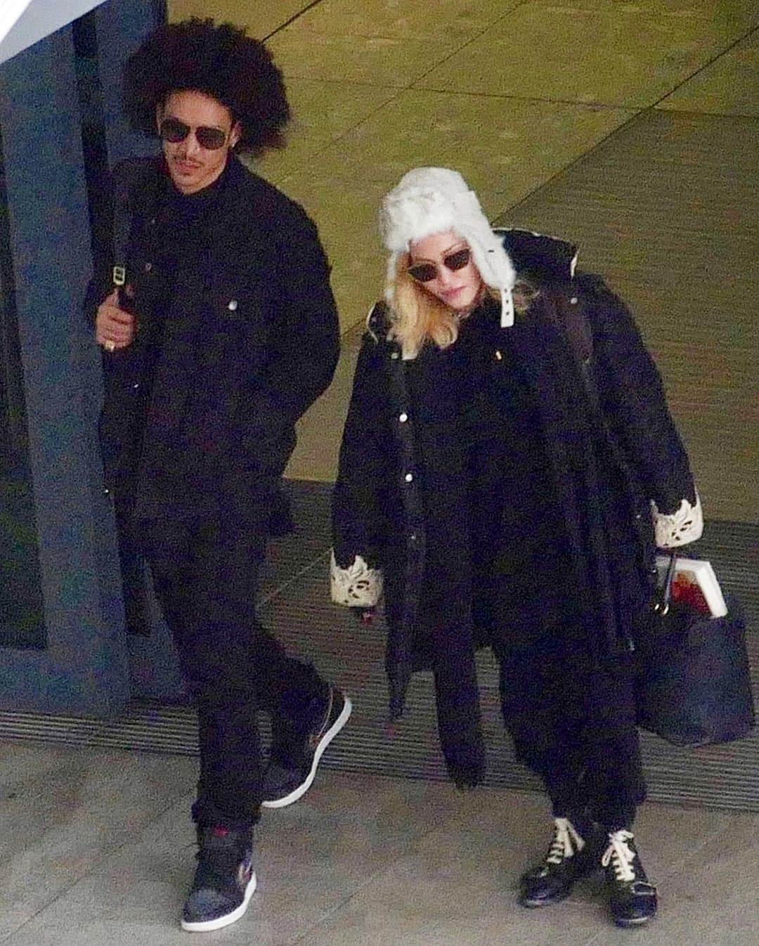 Just Jaredさんのインスタグラム写真 - (Just JaredInstagram)「Madonna and new boyfriend Ahlamalik Williams were joined by her family while arriving in London #Madonna #AhlamalikWilliams Photos: Splash, Backgrid」12月29日 3時55分 - justjared