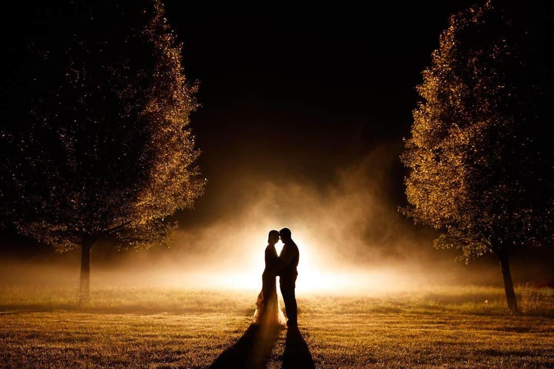 CANON USAさんのインスタグラム写真 - (CANON USAInstagram)「"Wedding shot in Hudson, MA. Foggy night and this was literally the very last shot of the evening. As I was leaving I saw how the car headlights of other cars leaving were lighting the fog so I turned around. Set up 1 speed light (600rt) and went back to ask the couple to pose for 1 last shot." #MyCanonStory  Photo Credit: @stewesonphoto Camera: #Canon EOS-1D X Mark II Lens: EF 24-70mm f/2.8L II USM Aperture: f/4.5 ISO: 3200 Shutter Speed: 1/160 sec Focal Length: 33mm」12月31日 22時44分 - canonusa