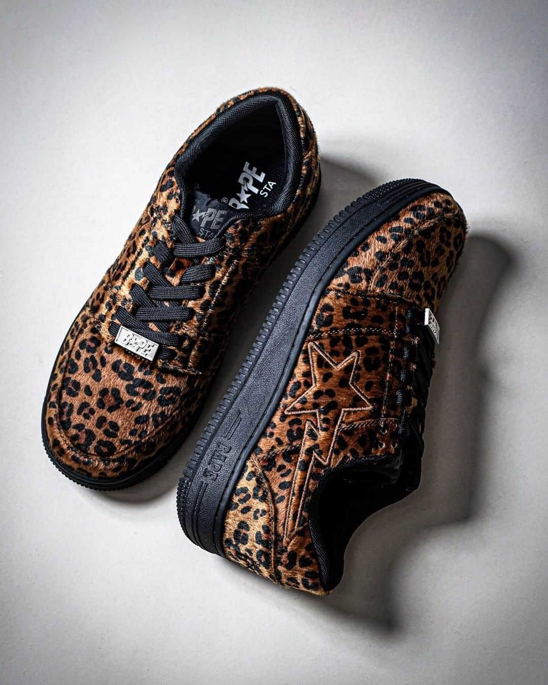 ア ベイシング エイプさんのインスタグラム写真 - (ア ベイシング エイプInstagram)「Dare to edge your look with this all-over LEOPARD BAPE STA™. The sneaker is designed for a defined and sharp look with black details on the sole, shoe tongue, laces and lining. Once a huge trend in the 90’s, the strikingly bold ZEBRA pattern will be seen for the first time on BAPE®’s iconic sneaker. The outfit possibilities are endless with this monochromatic pair. The sole and iconic STA motif is treated with white stitching for a clean look. Available on Saturday, January 4th at BAPE STORE® locations and BAPE.COM WEB STORE. #BAPESTA #bapesta20th」1月2日 8時00分 - bape_japan