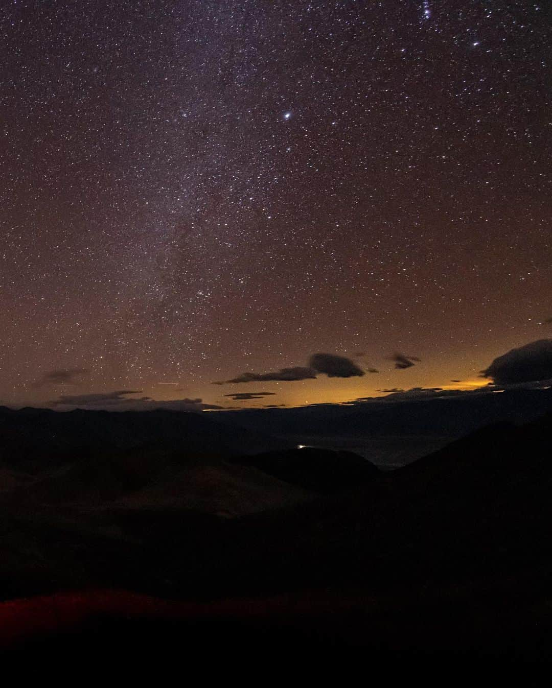 National Geographic Travelさんのインスタグラム写真 - (National Geographic TravelInstagram)「Photo by @babaktafreshi | As part of a long-term effort, I photograph the natural night environment and the problem of light pollution. On assignment for @natgeo, I was in Death Valley National Park. Standing under an ocean of stars at this high altitude, the glow of Las Vegas is still boldly visible, disturbing the natural environment from 90 miles (145 kilometers) away. But more surprising is the fainter glow behind me (swipe). This is Los Angeles, still visible from 170 miles (275 kilometers) away.  Light pollution is a story that many of us are dealing with but few are talking about. It's not only about the vanishing beauty of stars. This is a massive waste of energy, sending undirected and unshielded light to the sky. It's about the environmental impact on birds, insects, and many other species, including us.  On natgeo.com, see “Our Nights Are Getting Brighter, and Earth Is Paying the Price,” and follow me @babaktafresh for more. #saveournightsky #deathvalley #lightpollution #lasvegas」1月29日 3時12分 - natgeotravel