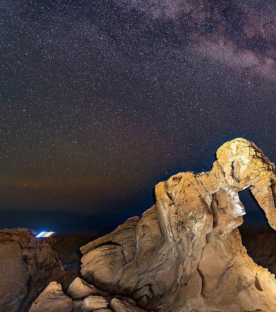 NikonUSAさんのインスタグラム写真 - (NikonUSAInstagram)「Elephant Rock: under the stars in the Valley of Fire State Park, the lights of Las Vegas in the background.⠀ ⠀ ​This breathtaking shot was captured by #Nikon photographer @wischmann_toechter with the #D810A and AF-S #NIKKOR 14-24mm f/2.8G ED lens!⠀ ⠀ ​#NikonNoFilter #travelphotography #elephantrock #astrophotography #starscape」1月29日 3時18分 - nikonusa