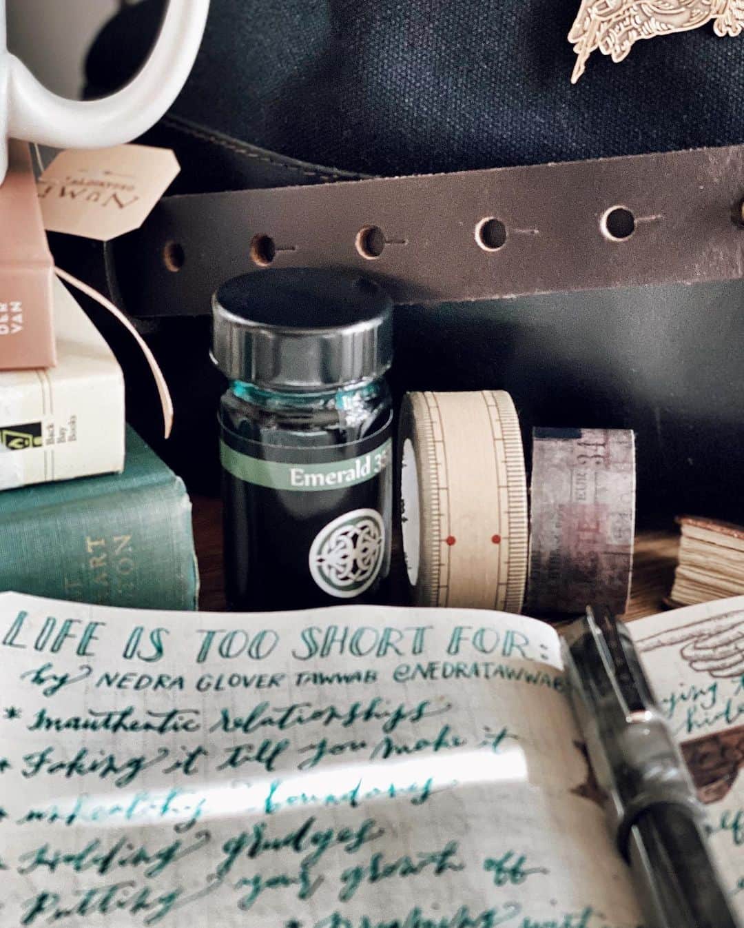 Catharine Mi-Sookさんのインスタグラム写真 - (Catharine Mi-SookInstagram)「Today’s self-care: a pause in the day for rooibos tea in my favorite mug, bullet-journaling a helpful list by @nedratawwab, making my creative nook beautiful for no other reason than it bringing me joy, affirming myself out loud with truth, and unpacking a fear and choosing to honor what is healthy for me instead of yielding to that fear. Step by step, step by step. . . Here is the list by @nedratawwab from her post earlier today that I penned in my weekly bullet journal — . . Life Is Too Short For: . * Inauthentic relationships * Faking it till you make it * Unhealthy boundaries * Holding grudges * Putting your growth off * Dreaming without creating goals * Second-guessing yourself * Trying to hide who you are to fit what others want you to be * Self-pity . “Be mindful of who you spend time with and how you spend your time.” -Nedra Glover Tawwab . . Do any of these resonate with you? Would you add anything to this list? This is my journal prompt for later — which of these are prominent in my life right now and what I might add to this list as well. What is something you can do today to take care of yourself? . . Joyful nook: Model 03 fountain pen with the steel extra-fine flex nib inked with Emerald 357, all by @franklinchristoph. Vagabond Notebook & Fortis Slingbag co-designed between @franklinchristoph and myself - link in bio. Universal Planner TN Insert @soumkine. Drafter Antique Textiles Pouch @pegandawl. Stickers & LCN brass pin @kiroku.de. Winter 2020 issue of @genic_mag (I have a feature in it). . . #selfcareroutine #bulletjournallove #journaling #franklinchristoph #fountainpens #fountainpenink #vagabondnotebook #fortisslingbag #whatsinmybag #travelersnotebook #soumkine #bulletjournalinspiration #bujoinspiration #bujoideas #bujospread #bulletjournalideas #stationerylover #pegandawl #thedailywriting #petalsandprops #loveforanalogue #genic_mag #ofquietmoments #hyggelife #bookaesthetic #teaandseasons #plannercommunity #journallove」1月29日 2時17分 - catharinemisook