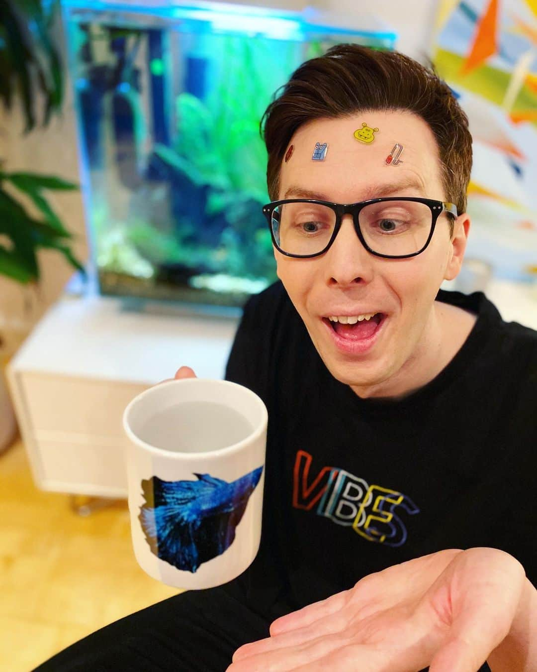 フィル・レスターのインスタグラム：「Thanks for all the birthday wishes! 🥳 ..If you’re wondering how wild I am my favourite gift was a mug with a photo of my fish on it.」