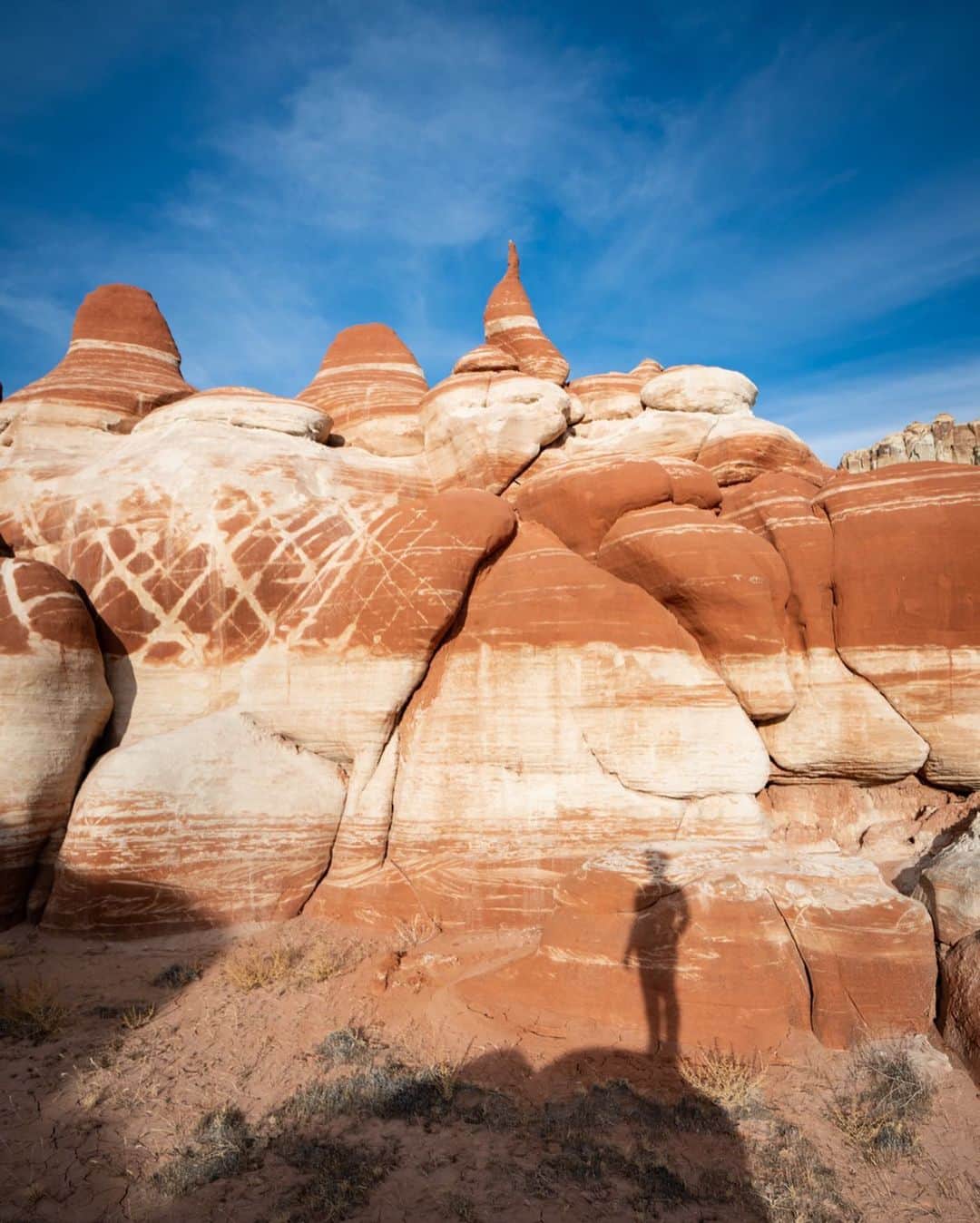 Travis Burkeのインスタグラム：「What a treat it was to meet up with @brandon_dugi and @t_secody to explore this place. We were given the opportunity to learn more about the history of the Navajo and Hopi, and the beautiful land they live on and protect.  We spent the day looking for a few of Terry’s grandpa’s lost sheep (and taking a few photos too 🤓). Out of respect for the locals and the landscape I was asked not to share the location. It is rare these days to be fortunate enough to experience a place with few footprints. I will definitely cherish these moments.  As a reminder, please make sure to always be respectful of the places we visit and when possible, always try to leave a place better than you found it. #respectandprotect  Thanks @gypsealaysea for capturing all of the awesome in-between moments too!」