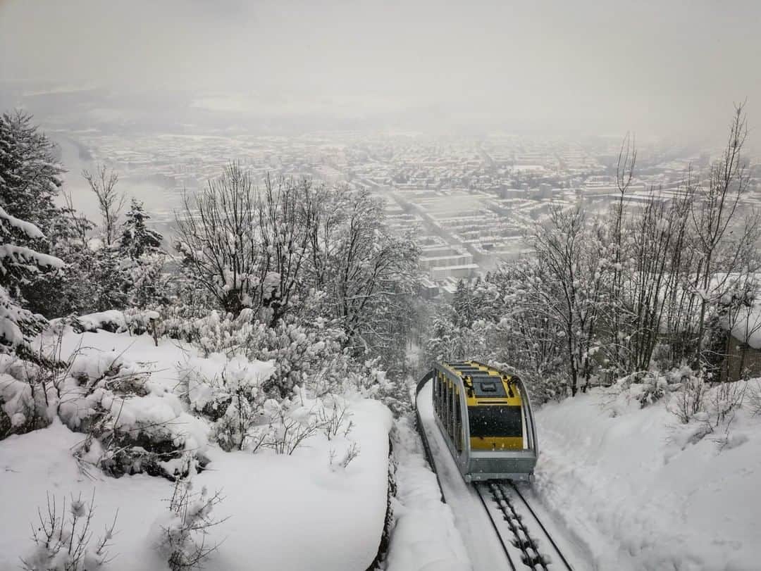 National Geographic Travelさんのインスタグラム写真 - (National Geographic TravelInstagram)「Photo by Robbie Shone @shonephoto | During heavy snowfall, the Hungerburgbahn in Innsbruck, Austria, continues to carry groups of tourists up the slopes of the Nordkette (Northern Range).」1月7日 14時09分 - natgeotravel