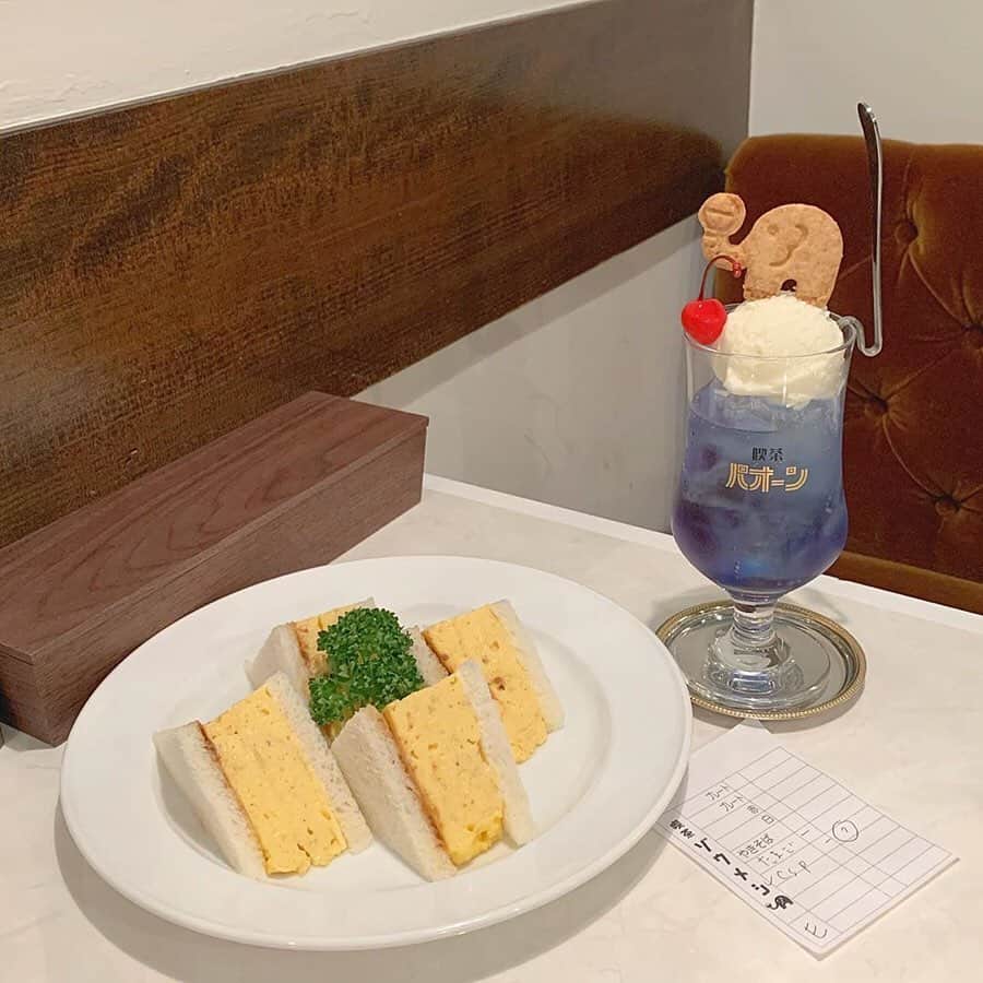 Nom de plumeさんのインスタグラム写真 - (Nom de plumeInstagram)「#喫茶パオーン 「ぞうめし屋」など京都や愛知で 人気のカフェ4店舗目が東京にオープン！ その名も『喫茶パオーン』🐘🍒 ゾウのクッキーが乗ったソーダは、 京都の「喫茶ゾウ」でも話題になっていたよね😻  珍しい紫のソーダは、美しすぎて 思わず見とれちゃう…🥺♡ プリンアラモードや、トーストなど 喫茶店らしいちょっとレトロなグルメも ぜひ味わってみてね✨ 📍東京都世田谷区船橋1-1-12 営業時間：[月～木]9:00～17:00 [金・土・日]9:00～20:00 ◎詳しい情報はプロフィール欄のURLから 記事をチェックしてね☑︎🌼◎ −−−−−−−−−−−−−−−−−−−−−−−−−−−− Nomdeplumeで 紹介させていただける写真を募集中🧚‍♀️💜 素敵な写真が撮れたら  #nomdeplume をつけるか このアカウントをタグ付けしてね💫 −−−−−−−−−−−−−−−−−−−−−−−−−−−− 🎀photo by 🎀 ・@ars_519 ・@miusta0224 ・ ・ ・ ◇◇◇◇◇◇◇◇◇◇◇◇◇◇◇◇◇◇◇◇◇◇◇◇◇◇◇◇◇ #nomdeplume #喫茶ゾウ #喫茶ゾウメシ #喫茶店 #喫茶店巡り #カフェ #カフェ巡り #千歳船橋カフェ #クリームソーダ #世田谷カフェ #東京カフェ "」1月8日 2時27分 - nomde_official