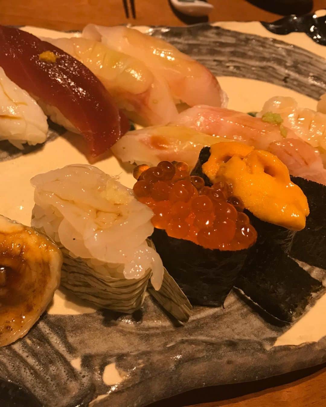 Yun chiさんのインスタグラム写真 - (Yun chiInstagram)「石川富山3日間で食べた美味しいもの🤤 みんなもいったら絶対食べてほしい🍶🦀🐟🐚 . #刺身 #のどぐろ #白海老 . #幻魚　←ゲンゲ撮り忘れた . #日本海のお魚ってなんでこんなにシャンとしてるの？ . #香箱蟹 #蟹の食べ方レクチャーしすぎてメンバーに嫌われた . #バイ貝 #焼いても刺身でも美味しい最高 . #寿司 #刺身とは一味違うよね . #富山駅近くトレンディだったラーメンショップ #ひげラーメン . #チャンピオンカレー #チャンカレ高柳店 . #会場の並びのおしゃれな本屋さん #マサラチャイ #石引パブリック 📚☕️ . #めん八小杉本店 #帰り際に回収した #ブラックラーメン #人生で食べたラーメンランキングにめり込む美味しさ . #完全に食べ過ぎ #富山石川グルメ全部のせ #帰宅後から始まるダイエット #japantravel#japantrip#japanesefood#toyama#ishikawa」1月8日 13時47分 - _yun_chi_