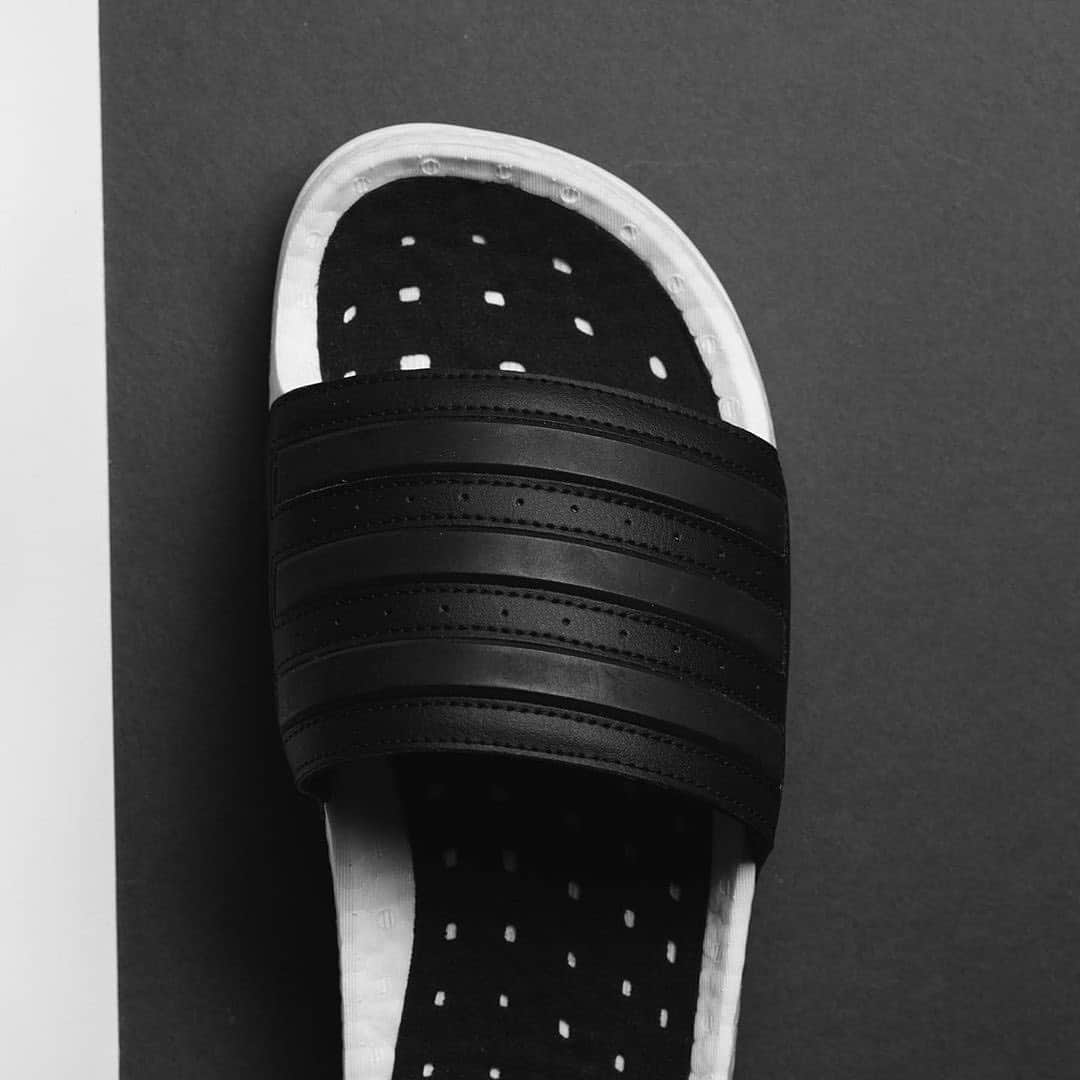 HYPEBEASTさんのインスタグラム写真 - (HYPEBEASTInstagram)「@hypebeastkicks: @adidas has taken its BOOST cushioning to the next level by incorporating it into the classic 'adilette' slide to create the new adilette BOOST. Arriving in a black and white colorway, the slides are available now at the adidas webstore and at retailers like @sneakerpolitics for $60 USD.⁠⠀ Photo: Sneaker Politics」1月13日 2時09分 - hypebeast