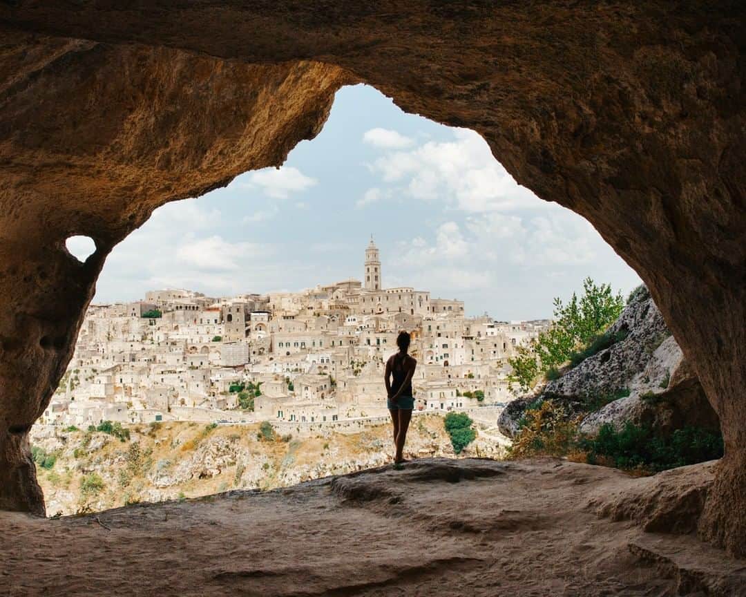 National Geographic Travelさんのインスタグラム写真 - (National Geographic TravelInstagram)「Photo by @MichaelGeorge | The area surrounding Matera, Italy, is riddled with caves. You can clamber into them and get a spectacular view of the city across the gorge. Matera has long been known as the “cave city,” because of the Sassi (literally meaning “stones”), which are cave dwellings with a dark history. These caves were once filled with families of as many as ten people, sleeping alongside their livestock. In the 1950s, the Italian government recognized their plight, and those living in the caves were evacuated to newly built homes. Today, the Sassi have been transformed into hotels, B and Bs, restaurants, bars, and artist studios. #matera #italy #cavecity #sassi #materaitaly」1月13日 8時05分 - natgeotravel