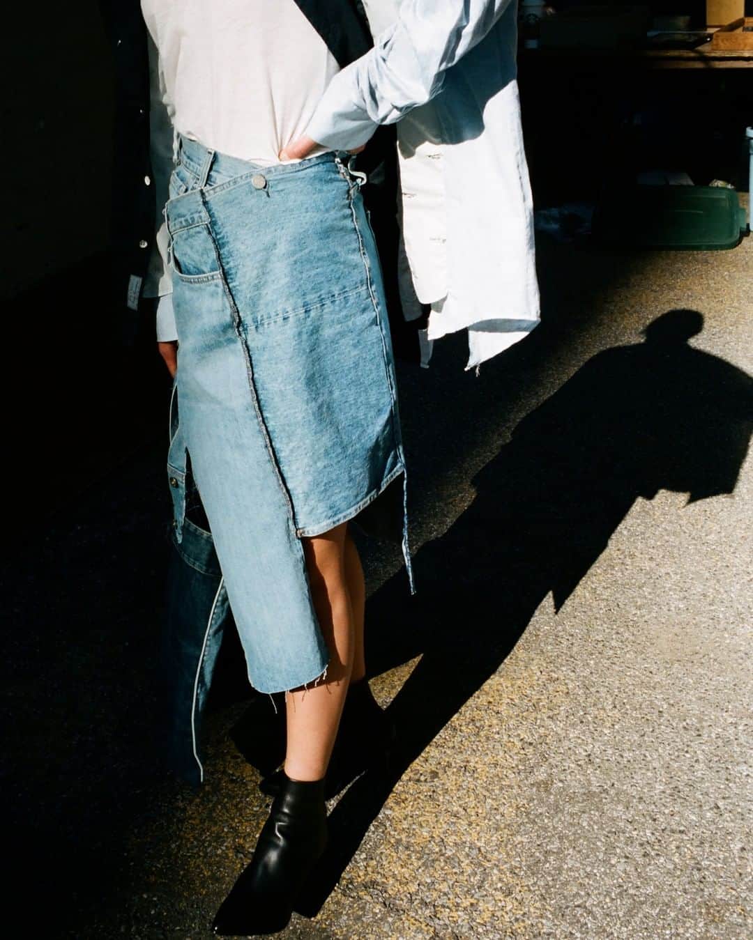 ラグ&ボーンのインスタグラム：「A singular silhouette. This season we've collaborated with @bonum.jp, the original denim reworkers, to turn #ragandbone iconic styles into twisted versions of themselves. - The one-of-a-kind upcycled collection is available for a limited time online and in select stores.  #ragandboneXBonum shot by @maxfarago」