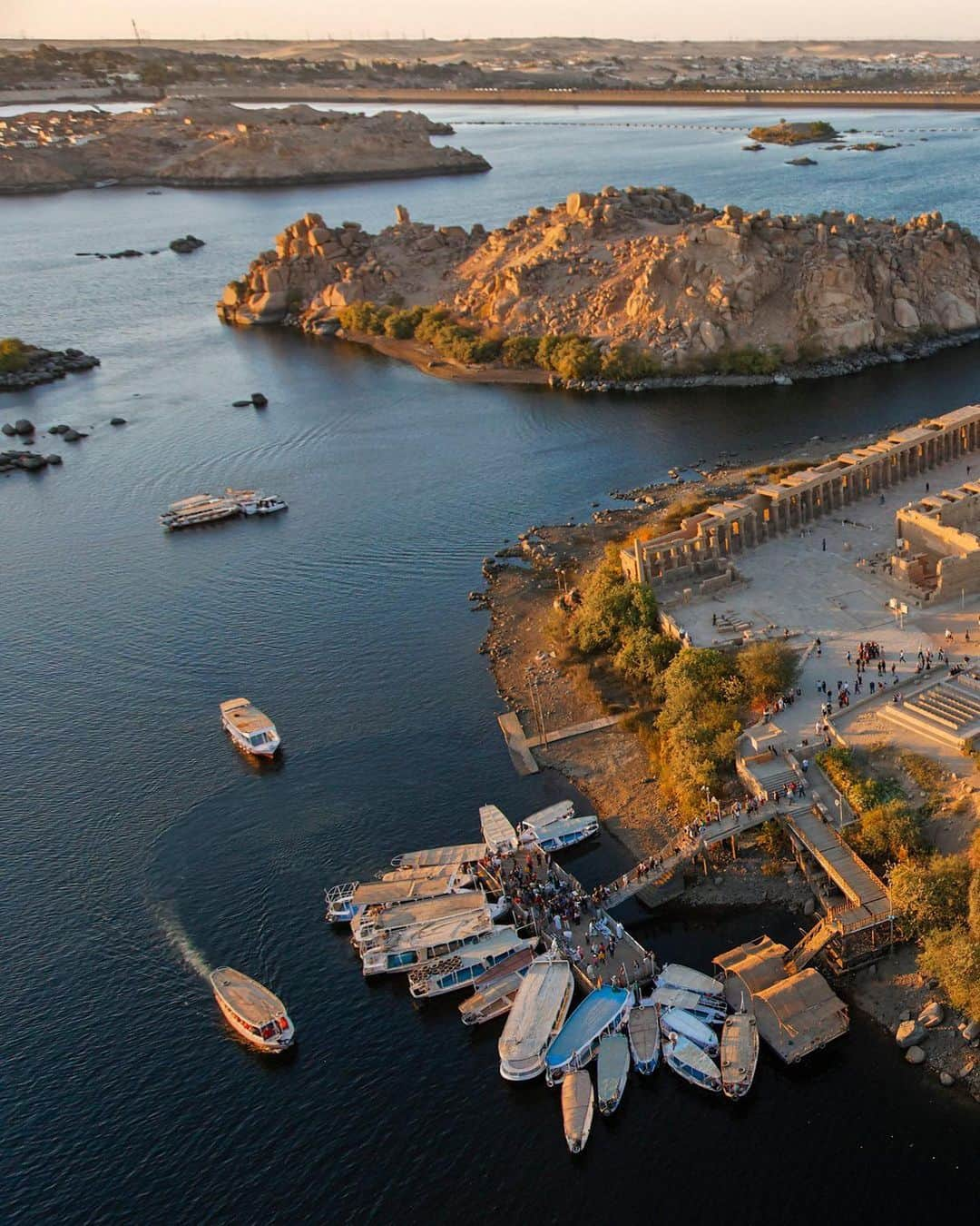 National Geographic Travelさんのインスタグラム写真 - (National Geographic TravelInstagram)「Photo by George Steinmetz @geosteinmetz | Philae Temple was built on an island near the First Cataract of the Nile during the Ptolemaic period. After construction of the first Aswan Dam, it was seasonally flooded before being relocated by @UNESCO to this higher site on an adjacent islet. In ancient Egypt it was a site for religion as well as commerce, as trade goods had to be off-loaded here to pass the rapids.  To view more of our world from above, follow @geosteinmetz.」1月14日 3時12分 - natgeotravel