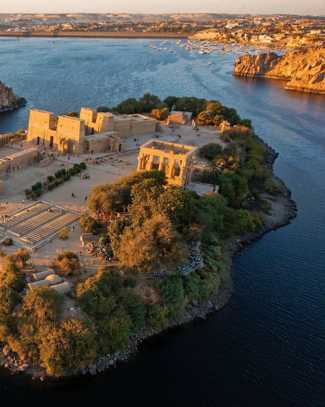 National Geographic Travelさんのインスタグラム写真 - (National Geographic TravelInstagram)「Photo by George Steinmetz @geosteinmetz | Philae Temple was built on an island near the First Cataract of the Nile during the Ptolemaic period. After construction of the first Aswan Dam, it was seasonally flooded before being relocated by @UNESCO to this higher site on an adjacent islet. In ancient Egypt it was a site for religion as well as commerce, as trade goods had to be off-loaded here to pass the rapids.  To view more of our world from above, follow @geosteinmetz.」1月14日 3時12分 - natgeotravel