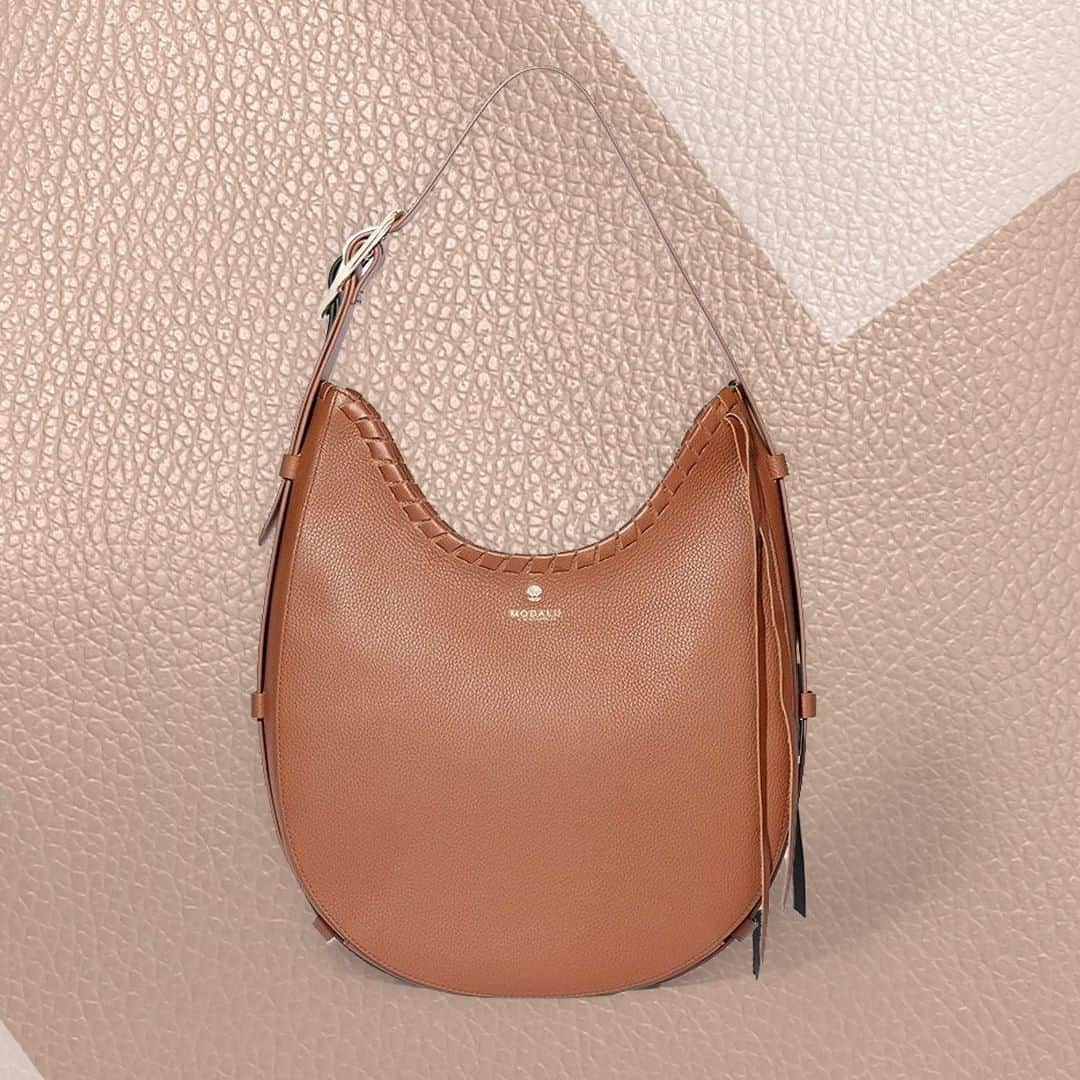 モダルーのインスタグラム：「Simple yet sophisticated, the Luna scoop shoulder is cleverly crafted to sit neatly under your arm. Was £169, now £40 - use sale20for an extra 20% off at the checkout」