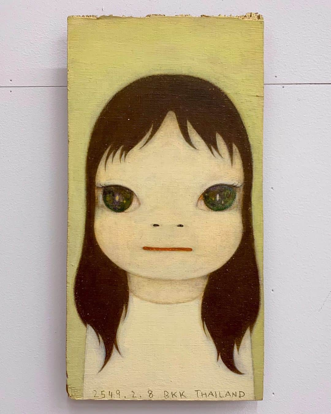 奈良美智のインスタグラム：「this small painting on found plywood was made in Bangkok, Thailand in 2006 (2549). many drawings and some paintings are created in my friend’s house RAJATA. I miss the street called Samsen Soi 5.」