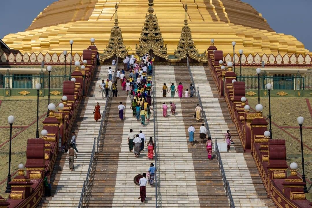 National Geographic Travelさんのインスタグラム写真 - (National Geographic TravelInstagram)「Photo by @amandamustard | Visitors ascend the stairs of the Uppatasanti Pagoda in Nay Pyi Taw, the capital of Myanmar. Completed in 2009, it was built as a replica of Yangon's Shwedagon Pagoda, with only a 30-centimeter (12-inch) difference in height.」1月15日 18時08分 - natgeotravel