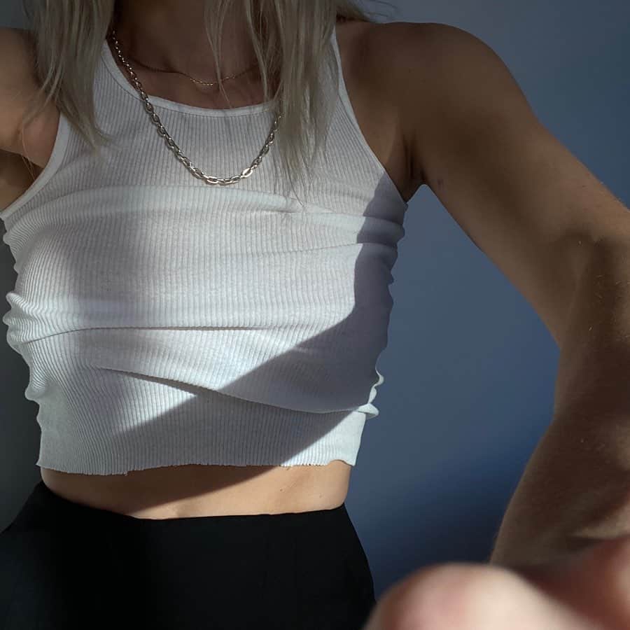 のインスタグラム：「If it’s not a white tank top I’m not interested」