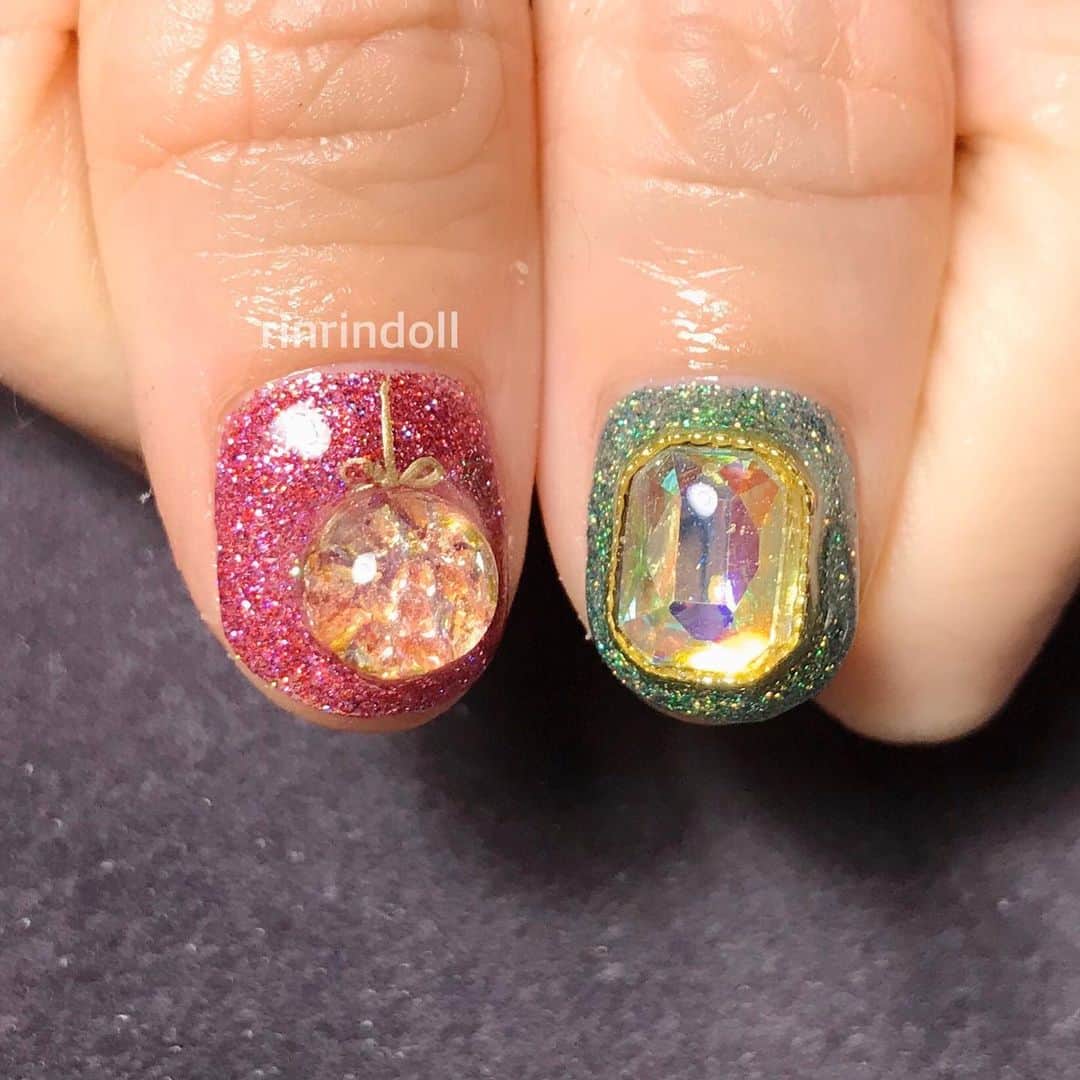 RinRinさんのインスタグラム写真 - (RinRinInstagram)「A little belated but these were my holiday nails for all of December by @kiyomi.lovl of @lovlnail ❄️✨ these were inspired by the new Anna Sui Black’s trio eyeshadow colors (have a video review on it up on my YouTube channel🎥✨) they’re very over-the-top bejeweled nails, perfect for all of the holiday events I was doing🙌🏻 . . 12月のネイル！ @lovlnail の @kiyomi.lovl さんに作ってくれました〜ありがとうございます！すごく豪華で、クリスマスイベントにぴったり🙌🏻✨ . . 💅🏻 #rinrindollnails . . #rinrindoll #lovlnail #shibuya #tokyo #japanesenailart #japanesenails #shibuyanailsalon #tokyonailsalon #渋谷 #渋谷ネイルサロン #東京ネイルサロン #東京 #ジェルネイル #クリスマスネイル #ホリデーネイル #冬ネイル #gelnails #christmasnails #holidaynails #japanesegel #japanesenailsalon #nails #ネイル」1月16日 18時19分 - rinrindoll