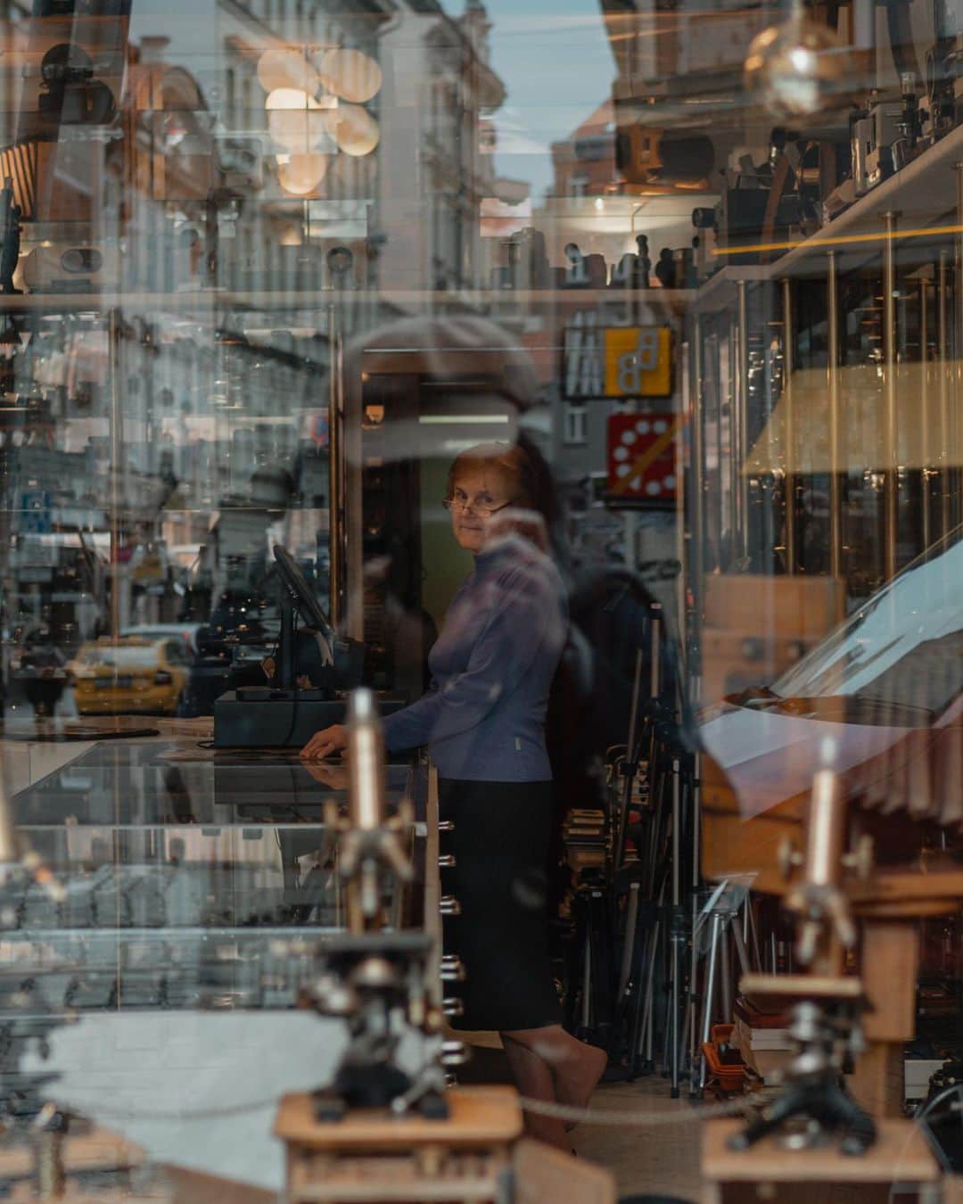 Putri Anindyaのインスタグラム：「a vintage camera store // ⁣ ⁣ Last week I explored Prague with @capra311. We roamed around the pretty streets, watched the trams, under the light rain, it all felt wonderful. On the way to our airbnb, we decided to look for the vinyl stores. probably we’ll find some cheap first press vinyl, we thought. Just 50 more meters to the vinyl store, I stumbled upon this beautiful camera shop. A vintage. They have a lot of gorgeous old camera. But, i got mesmerised by the decoration and how everything look very nice. ⁣ ⁣ I took this image with a new mirrorless camera that probably someday will be in this kind of vintage store. Someday. It got me thinking how the camera will be in the future. Do you think it will not change much or it will be a totally different technology ?」