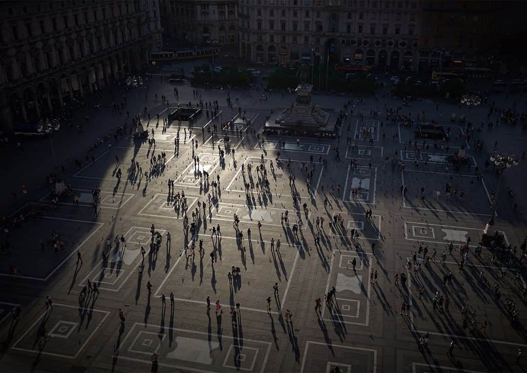 National Geographic Travelさんのインスタグラム写真 - (National Geographic TravelInstagram)「Photo by @chiaragoia | People walk in Piazza del Duomo in Milan, Italy, in the late afternoon light. Piazza del Duomo (literally Cathedral Square) is the main square in Milan and, with its Gothic cathedral, it’s the most iconic site in the city. The paving and parvis visible in this picture were designed by Piero Portaluppi in 1928.  Follow @chiaragoia for more images of Italy and other parts of the world. #piazzaduomomilano #milan #italy」1月18日 10時04分 - natgeotravel