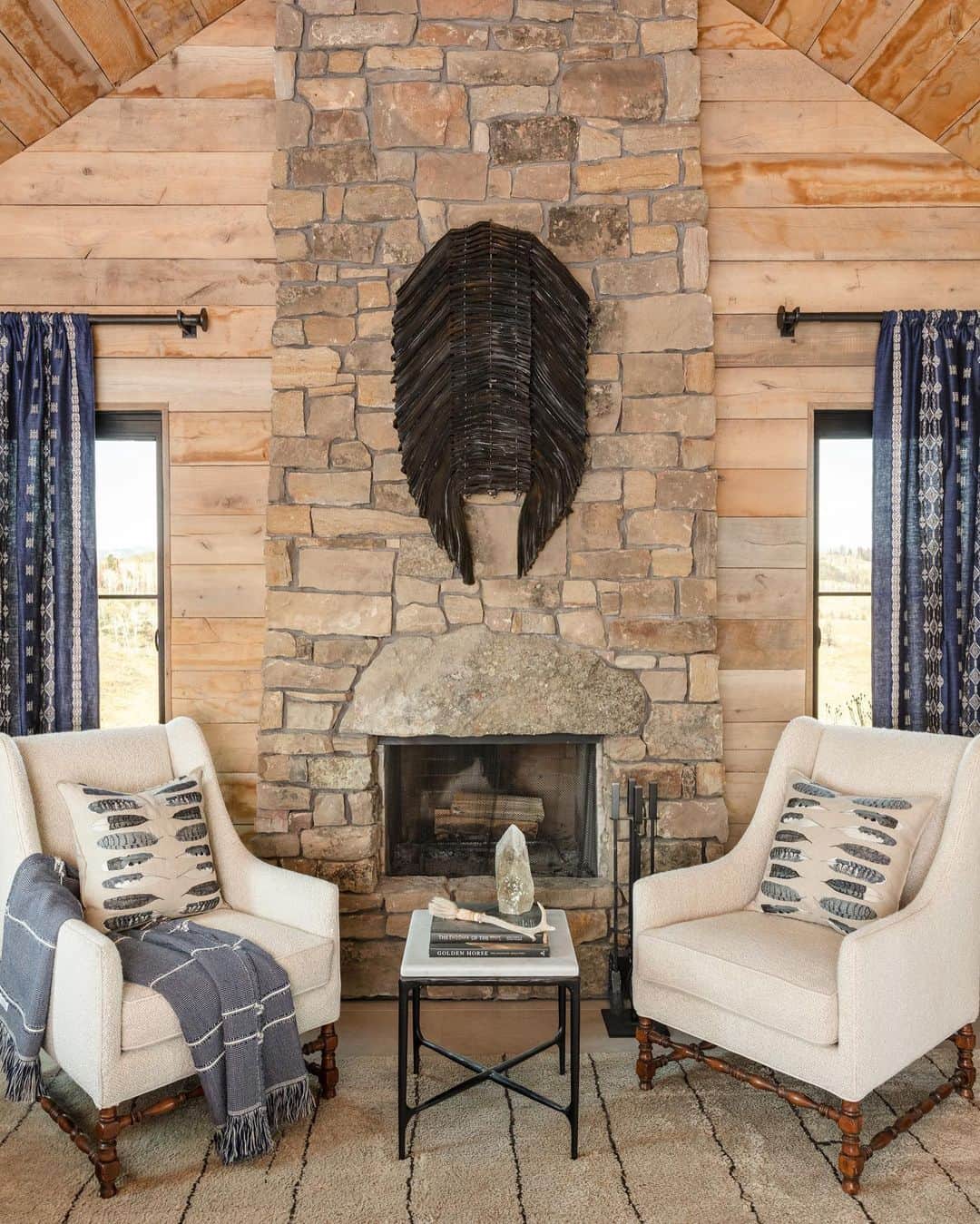 のインスタグラム：「What home projects are you taking on this month? Consider adding a seating area to your bedroom! Create a restful retreat with cozy arm chairs and a pair of pillows. Here we decorated with our Feather Harmony pillows and created custom drapes from our line of fabrics. 📷 by @willellisphoto」