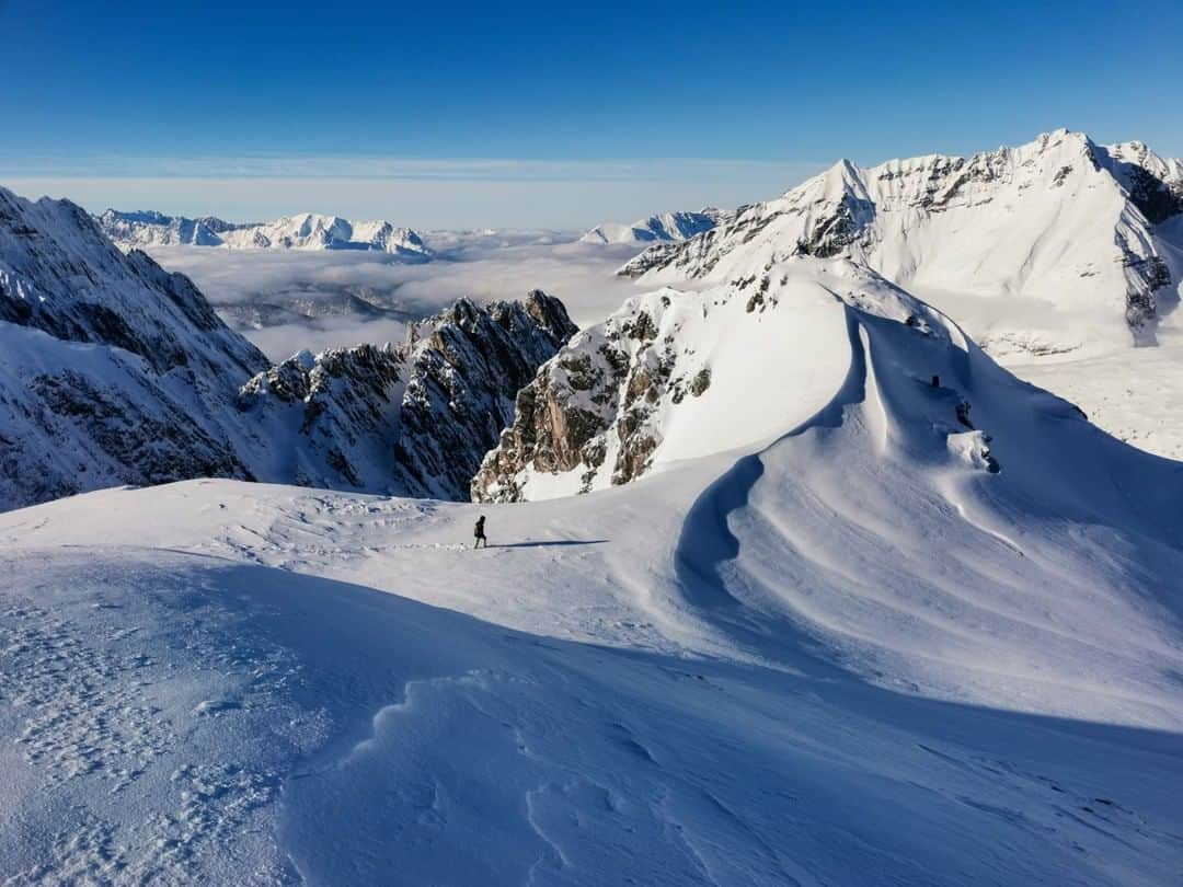 National Geographic Travelさんのインスタグラム写真 - (National Geographic TravelInstagram)「Photo by Robbie Shone @shonephoto | A lone hiker walks along the ridge of Austria’s Hafelekar Peak, with the Karwendel mountain range in the background. At this time of the year, the Austrian Alps are a real winter wonderland.」1月19日 10時05分 - natgeotravel