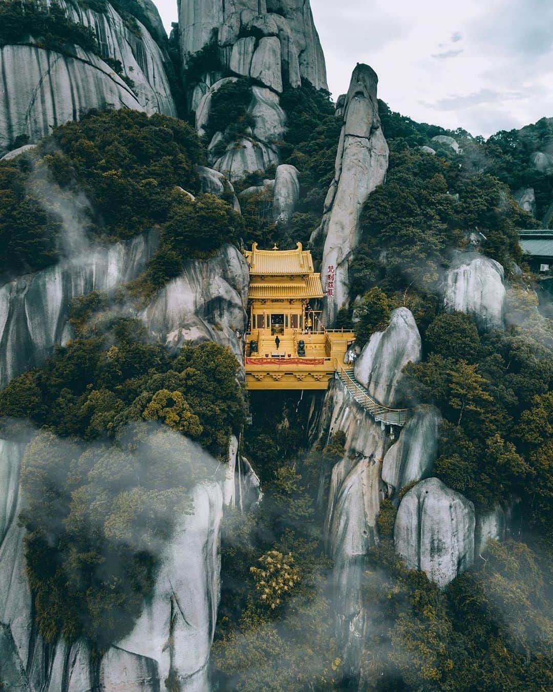 Instagramさんのインスタグラム写真 - (InstagramInstagram)「#HelloFrom Taimu Mountain in Fujian, China, where this bronze temple seems to float in thin air.⁣⁣ ⁣⁣ Say #HelloFrom your part of the world. ❤️ Please submit your own photos and videos to the project using the #HelloFrom hashtag. Any tagged visual shared with the hashtag is eligible for the project and, if selected, to be featured.⁣⁣ ⁣ Photo by @nk7」1月20日 3時22分 - instagram