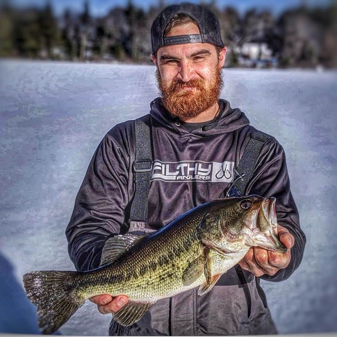 Filthy Anglers™さんのインスタグラム写真 - (Filthy Anglers™Instagram)「A rare weekend off for New Englanders, no football on Championship Sunday! Who’s team is still playing or who are you rooting for? Well with no football going on our good friend @andrew_knowlton had every reason to spend his Sunday on the hard water and not the couch. Check out this monster New Hampshire largemouth bass he picked up today, absolute chunk man. Congrats on the catch and looking forward to seeing you soon! You are Officialky Certifued Filthy - www.filthyanglers.com #smallmouth #fishing #catchandrelease #thetugisthedrug #getoutside #outdoorenthusiast #gonefishing #tightlines #fishingdaily #icefishijg #filthyanglers」1月20日 8時01分 - filthyanglers