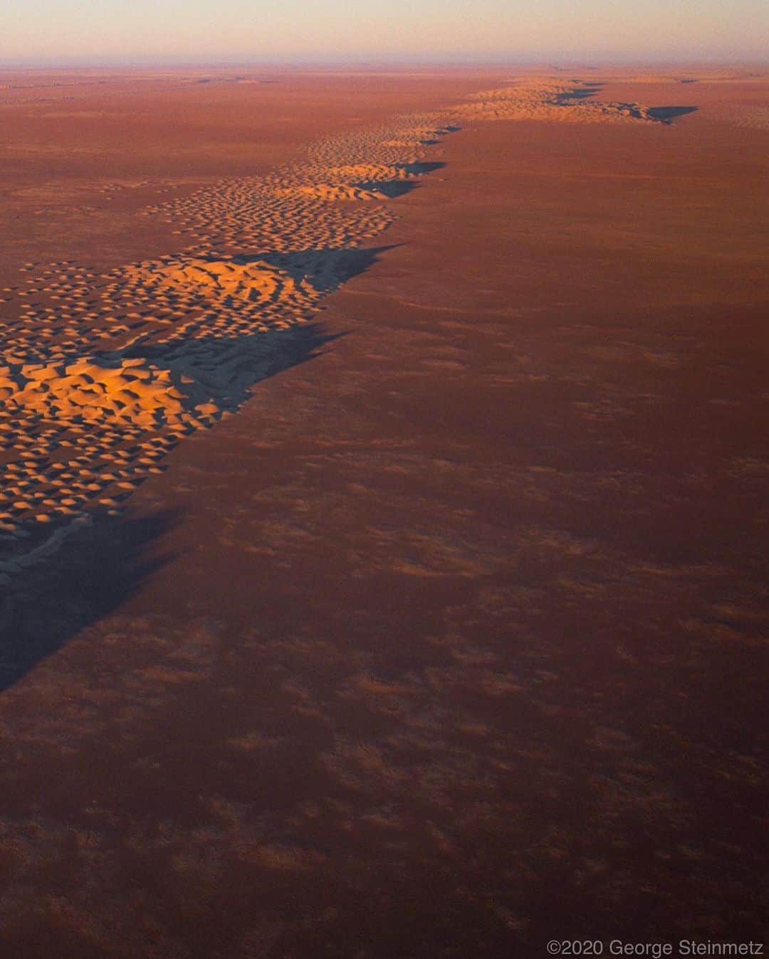 ナショナルジオグラフィックさんのインスタグラム写真 - (ナショナルジオグラフィックInstagram)「Photo by George Steinmetz @geosteinmetz | Dot-shaped barchan dunes migrate with the wind across the plains of Wadi Hazar, in the Yemeni part of the Rub al Khali (Empty Quarter). Some stuff, like this unusual natural phenomenon, you don’t find in school books: “The universe is not only queerer than we suppose, but queerer than we can suppose.”—J. B. S. Haldane #paramotor To explore more of our Earth from above, follow @geosteinmetz.」1月22日 4時38分 - natgeo