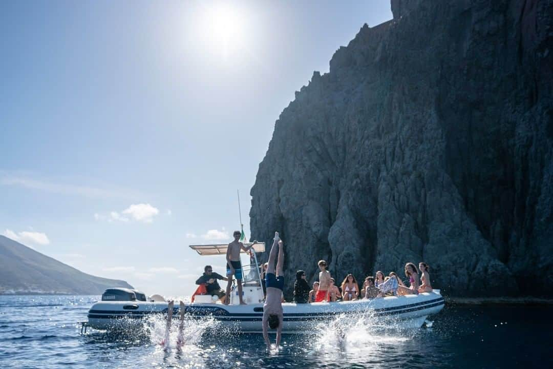 National Geographic Travelさんのインスタグラム写真 - (National Geographic TravelInstagram)「Photo by @andrea_frazzetta | Visitors on a boat trip around Stromboli. Local boats circle the island, giving the opportunity to admire the volcano from different points of view and dive into the blue waters of the Mediterranean. Stromboli, one of the most active volcanoes in the world, rises majestically in the middle of the sea north of the Sicilian coast.  To see more photos from my travels, follow me @andrea_frazzetta. #stromboli #volcano」1月24日 6時06分 - natgeotravel