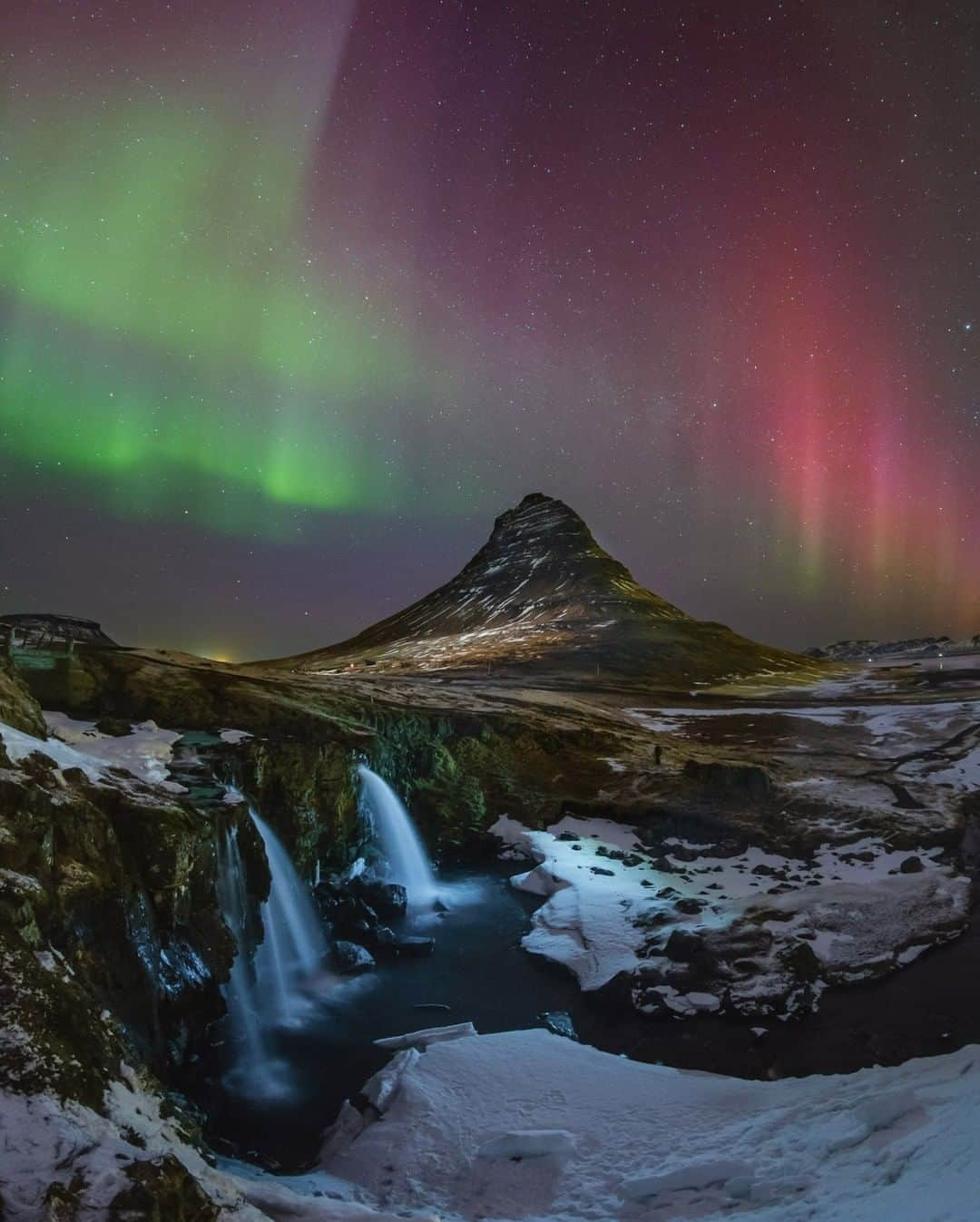 National Geographic Travelさんのインスタグラム写真 - (National Geographic TravelInstagram)「Photo by @babaktafreshi | The solar wind that reached the Earth’s magnetic field on this March evening generated impressive aurora displays. The colorful display appeared over an iconic landmark of Iceland, the waterfalls and mountain of Kirkjufell (Church Mountain) on the Snaefellsnes Peninsula.  Learn about the best aurora destinations in both hemispheres in my natgeo.com article “7 Magical Places to View Auroras,” and follow me @babaktafreshi for more. #auroraborealis #northernlights #nightphotography #twanight」1月24日 18時09分 - natgeotravel