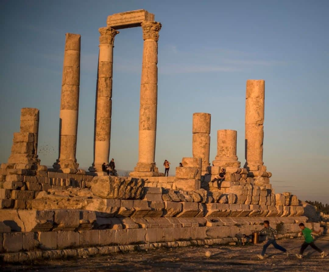 National Geographic Travelさんのインスタグラム写真 - (National Geographic TravelInstagram)「Photo by Muhammed Muheisen @mmuheisen | Children play with a ball near the Temple of Hercules, a historic site in the Amman Citadel in Jordan.  For more photos and videos from different parts of the world, follow me @mmuheisen and @mmuheisenpublic. #muhammedmuheisen #Amman #citadel」1月25日 10時04分 - natgeotravel