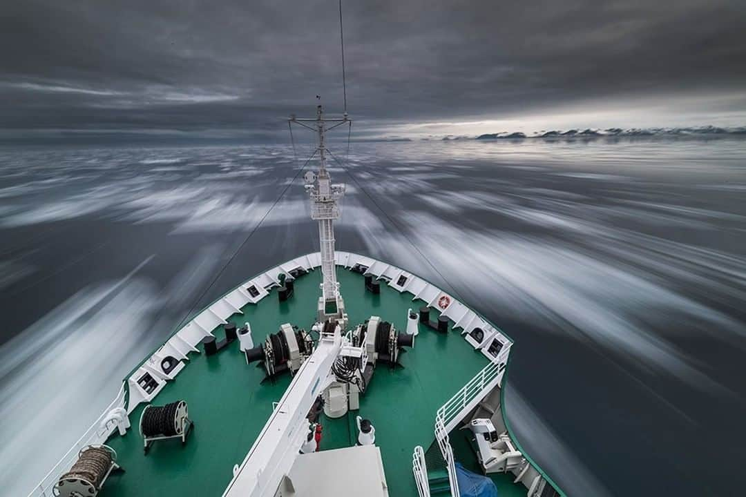 National Geographic Travelさんのインスタグラム写真 - (National Geographic TravelInstagram)「Photo by @daisygilardini | I took advantage of the summer's midnight sun while cruising the waters of the Svalbard archipelago. I used a tripod and an eight-second exposure to emphasize the ship’s movement among the ice floes. Follow me @DaisyGilardini for more images and stories behind the scenes. #svalbard #ice #seaice #ship #Norway」1月25日 18時08分 - natgeotravel