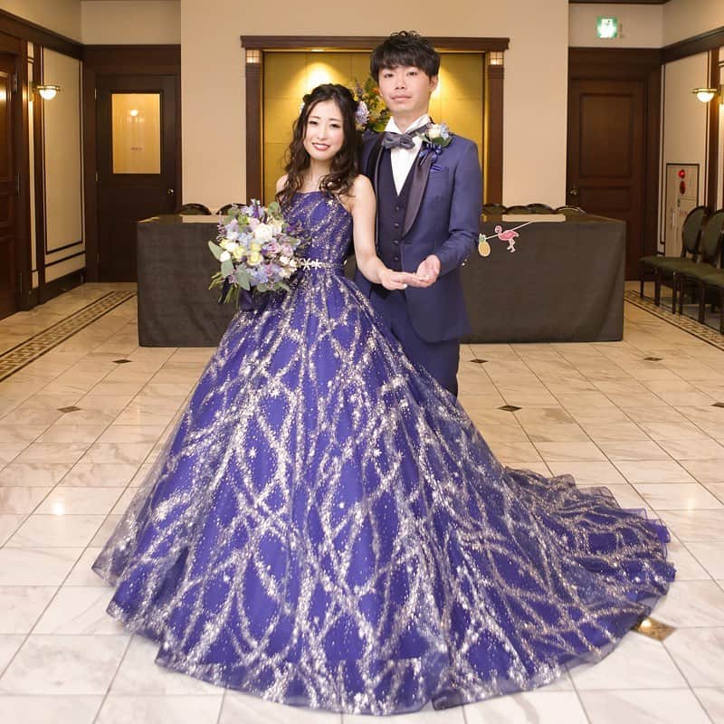 ホテルモントレウェディング【公式】 のインスタグラム：「♥ @montereyweddingをフォローして 『 #モントレ花嫁 』『 #ホテルモントレ』の タグをつけて投稿してくださいね＊*. . 💒👰ホテルモントレ仙台 @hotelmontereysendai_wedding . 披露宴の照明で華やかな 輝きが印象的なカラードレス♡ とってもお似合いです♩ . ——————————. ◆ブライダルフェア予約はこちらをcheck＊* http://bit.ly/2IdN6dk ◆ホテルモントレ仙台の公式HPはこちら* https://www.monterey-wedding.jp/sendai/ ——————————. . #モントレ #モントレ花婿 #プレ花嫁 #卒花 #marry花嫁 #dressy花嫁 #farnyレポ #プラコレ ﻿#maricuru #dressy花嫁 #日本中のプレ花嫁さんと繋がりたい #ウエディングニュース #flower #ウェディングドレス #dress #結婚式 #披露宴 #結婚式場 #2020年春婚 #2020年夏婚 #2020年秋婚 #2020年冬婚 #ネイビードレス #カラードレス #お色直し #ブルードレス」