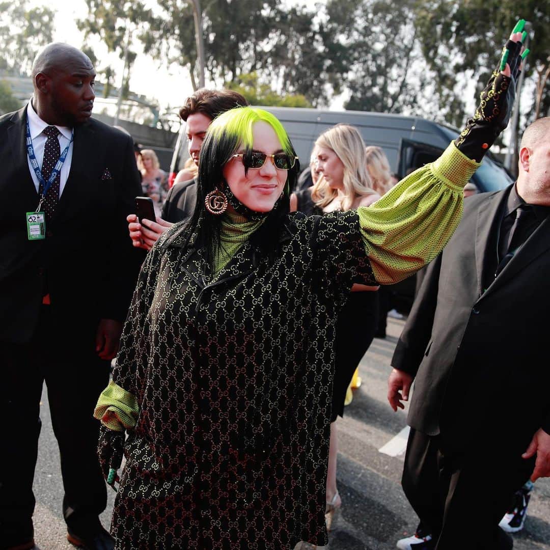 New York Times Fashionさんのインスタグラム写真 - (New York Times FashionInstagram)「@billieeilish arrived on the Grammys red carpet in an oversized suit best described as very Billie Eilish-ish: neon green and black ... @Gucci. Duh! Photographs by Emma Mcintyre/Getty Images; Rich Fury/Getty Images.」1月27日 8時42分 - nytstyle