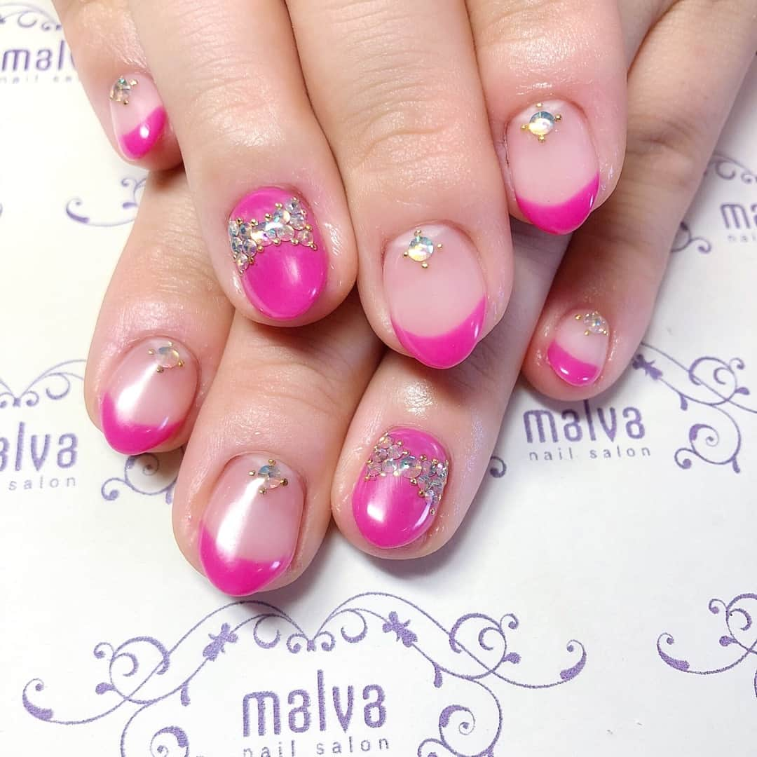 nailsalon malva（ネイルサロンマルヴァ）さんのインスタグラム写真 - (nailsalon malva（ネイルサロンマルヴァ）Instagram)「キャンペーン【フレンチスタイル022】❤︎⠀ ⠀ ビビットなピンクのフレンチにストーンでリボン🎀⠀ ⠀ ⠀ 𝐬𝐰𝐢𝐩𝐞で動画もご覧ください☺︎⠀ ⠀ ♥ 𝐧𝐚𝐢𝐥 𝐬𝐚𝐥𝐨𝐧 𝐦𝐚𝐥𝐯𝐚 ♥⠀ ⠀ ⠀ ご予約はLINEから⠀ LINE ID→《@malvaで検索🔍》⠀ ⠀ キャンペーンネイル・料金表は⠀ HPからご覧ください✯*･ :.｡⠀ ▶︎http://www.malvanail.com/sp/⠀ ⠀  #malva#nailsalonmalva#ネイル#nail#nailart#naildesign#nailstagram#beautysalonmalva#gel#ジェルネイル#ネイルデザイン#ネイル動画#ネイルサロン#ネイルチップ#ピンクネイル#malvaネイル#お洒落ネイル#ネイリスト募集#美甲#fashion#フレンチネイル#네일#젤네일#甲油#指甲#beauty#エニシーグローパック正規取扱店#エニシーグローパック#リアムール正規取扱店#エキスパートローション」2月22日 16時00分 - malva_nail