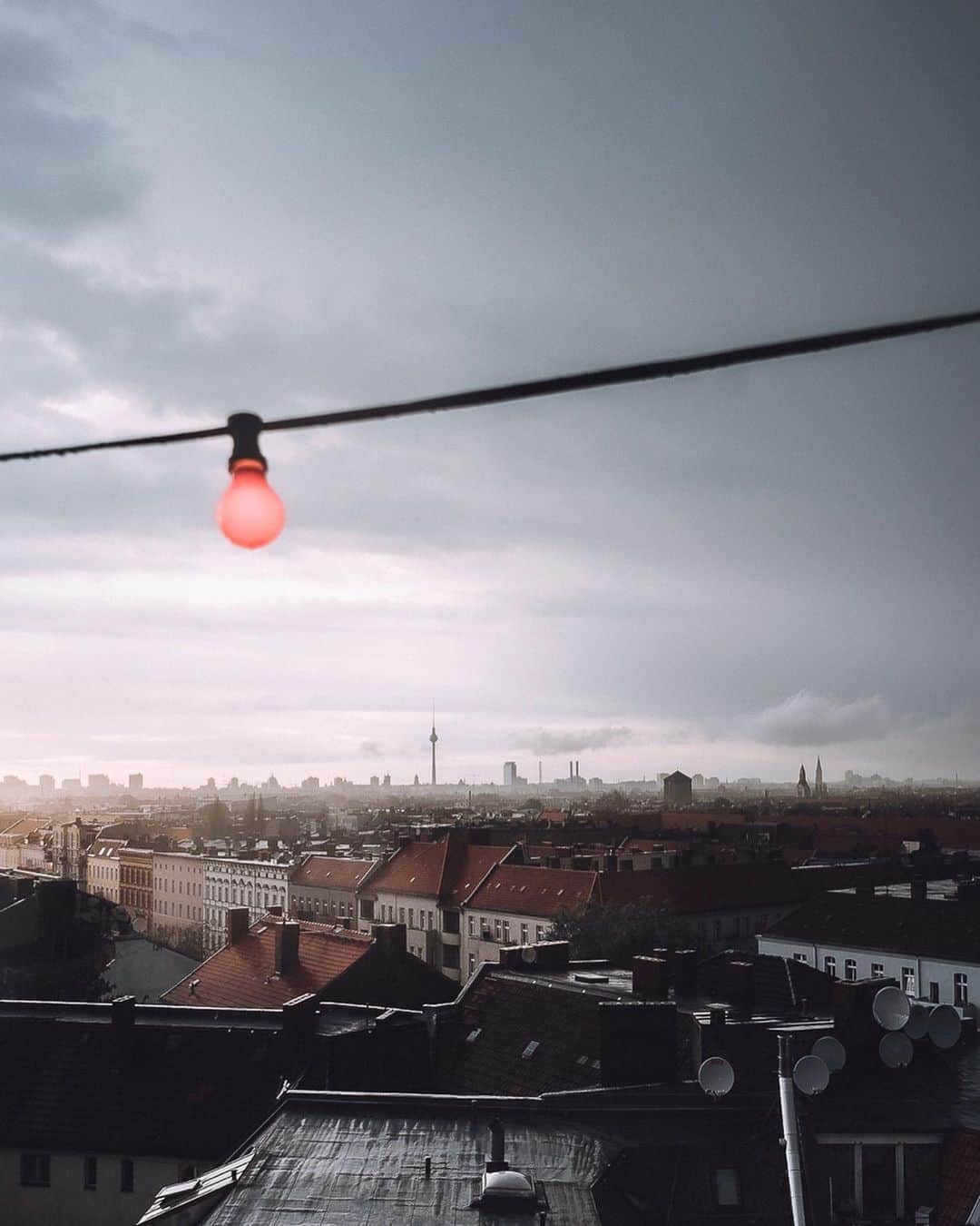 Thomas Kakarekoのインスタグラム：「old habits  I keep returning to this place at least twice a year, preferably after sunset on a rainy day. still the best view of Berlin’s skyline if you ask me. which one would you pick, 1 or 2?  #berlin」