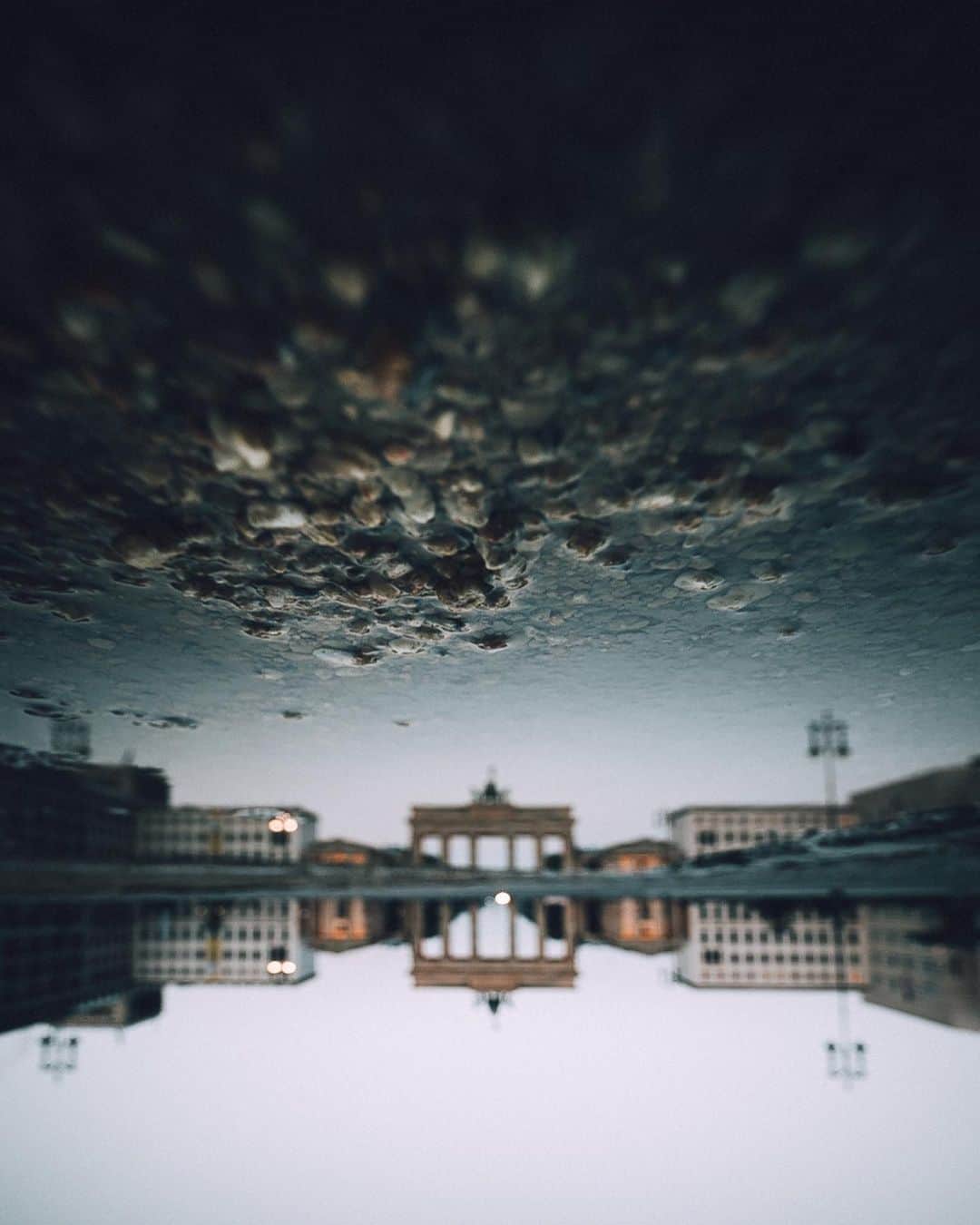 Thomas Kakarekoのインスタグラム：「spot check  two slightly different takes on the same reflection of the gate. 1 or 2, which one would you pick?  #berlin」