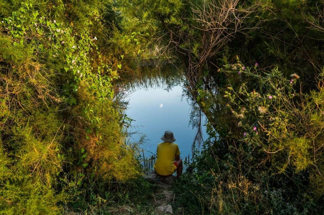 National Geographic Travelさんのインスタグラム写真 - (National Geographic TravelInstagram)「Photo by @amivitale | Reflections in Romania on the Danube Delta, the place where the legendary river meets the Black Sea. I had the privilege of traveling the length of the Danube River as part of “Danube Revisited: The Inge Morath Truck Project.” In July 2014, eight of us set out to follow Morath’s path along the Danube for five weeks. The photographers, each of whom won Magnum’s Inge Morath Award, converted a truck into a mobile gallery space that we used to exhibit Morath’s work in the villages and towns she photographed. At the same time, we created a new body of work about contemporary life in the region, finishing groundbreaking photographer Morath's dream of following the Danube from start to finish.  Follow @amivitale for more stories about the beauty and hope in the world. @natgeoimagecollection @thephotosociety @photography.for.good #danube #ingemorath #rivers #water #reflections」2月5日 6時06分 - natgeotravel