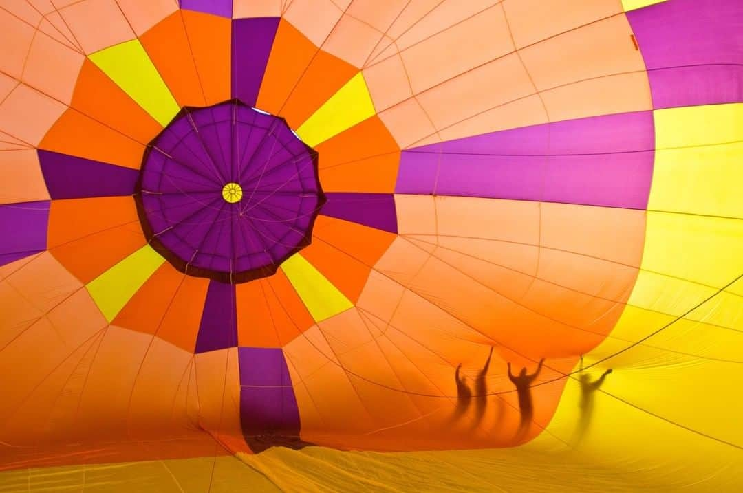 National Geographic Travelさんのインスタグラム写真 - (National Geographic TravelInstagram)「Photo by @michaelclarkphoto | Ghostlike figures push up the sides of a hot-air balloon at the Albuquerque Balloon Fiesta, the largest ballooning festival in the world. I waited for this image for years, and painstakingly planned to get lucky with this scenario. The ghost figures in this image turned out to be the balloon crew pushing up the side of the balloon so it would inflate faster. #hotairballoon #albuquerque #newmexico #albuquerqueballoonfiesta」2月8日 14時09分 - natgeotravel