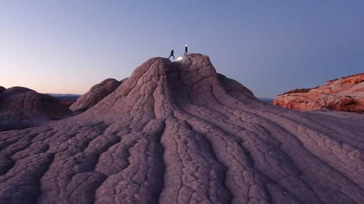 Travis Burkeのインスタグラム：「Last night we descended onto another planet and watched the full moon rise over this wild martian landscape! Swipe right to see our close encounter with the moon.  If you know where this remote planet is, please keep it unnamed and we can encourage others to research, explore and get lost in the beauty of the universe. 🧑🏼‍🚀🚀💫 #fullmoon #lunarlandscape #spacenerd」