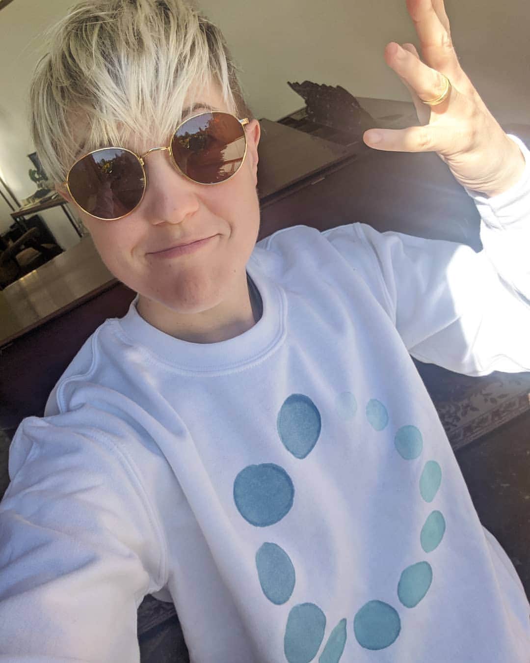 ハナー・ハートのインスタグラム：「50% off the white #BUFFERING hoodie!  Did this book change your life?  Writing it sure changed mine! Let's get cozy together! Link to sale in bio. 🏷️」