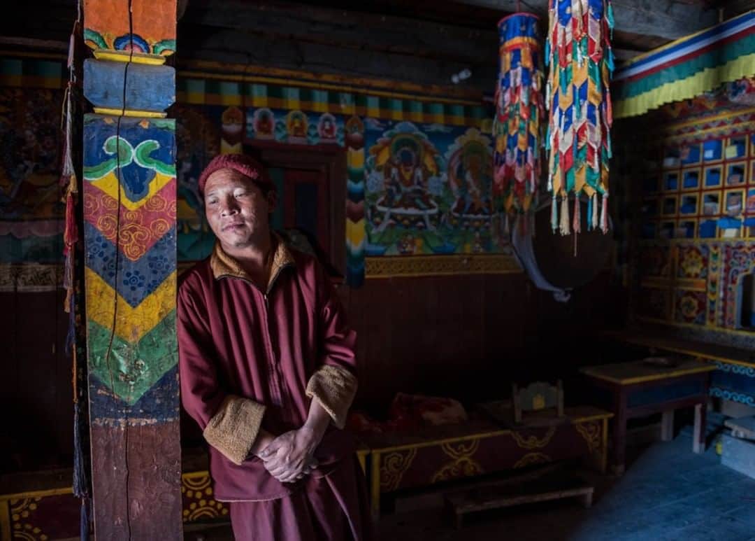 National Geographic Travelさんのインスタグラム写真 - (National Geographic TravelInstagram)「Photo by @bethjwald | A monk stands in the main room of the Bon temple, or “gompa,” outside the village of Ringmo. Known as Thasung Tsholing Gompa, it is one of the more important sites for the Bon religion in the remote region of Dolpo in western Nepal. Bon is a pre-Buddhist religion of the Tibetan Plateau and is still practiced in parts of the trans-Himayala.」2月14日 10時05分 - natgeotravel